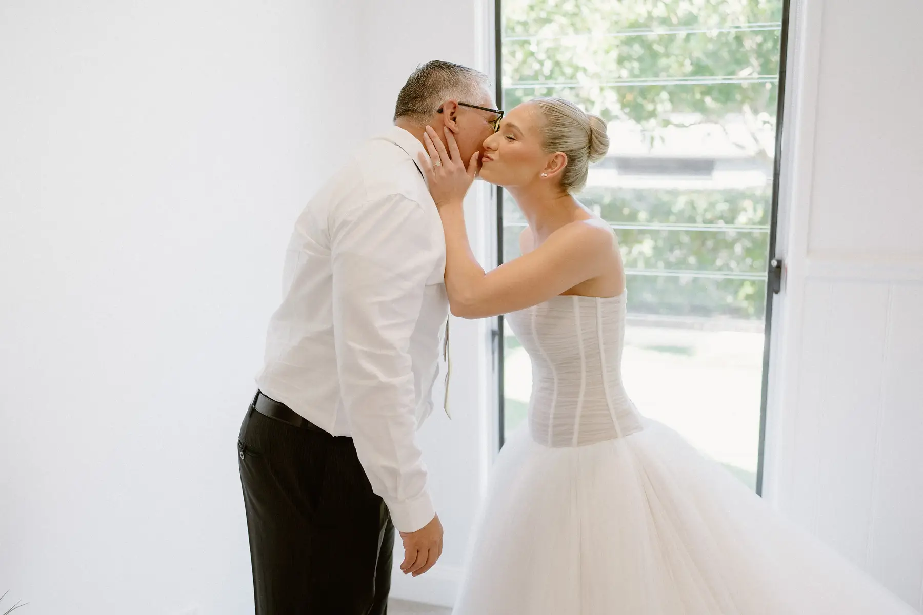 Georgia's father kissing her cheek when he sees her in her dress, Botanica Plantation House