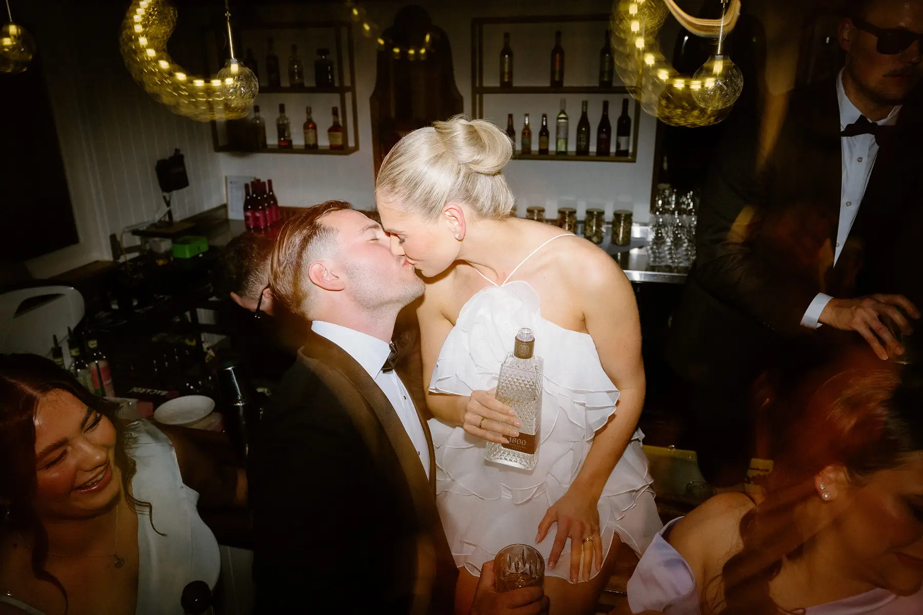 A kiss under the disco balls on the dance floor, Botanica Plantation House