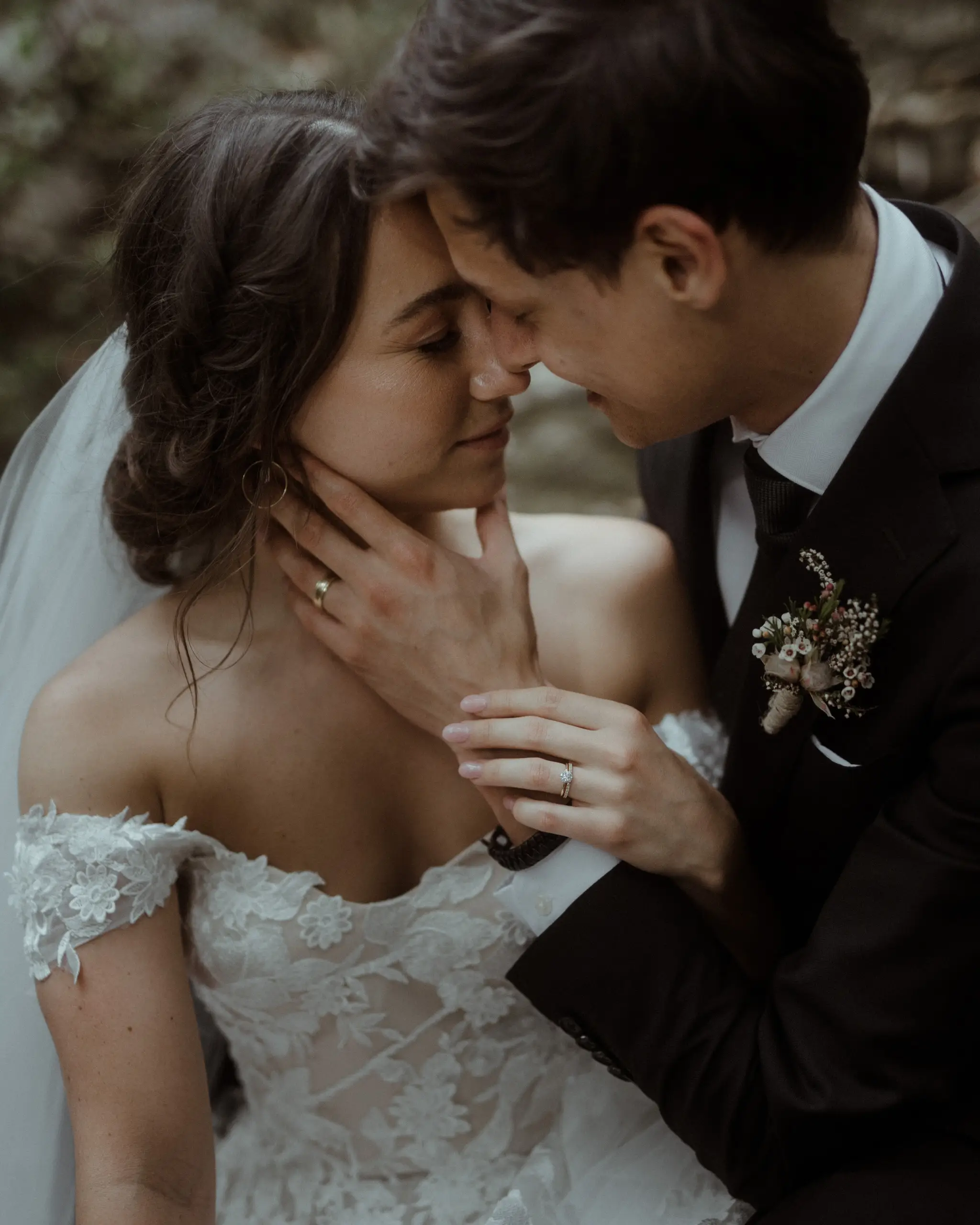 Foreheads together, her hand on his chest