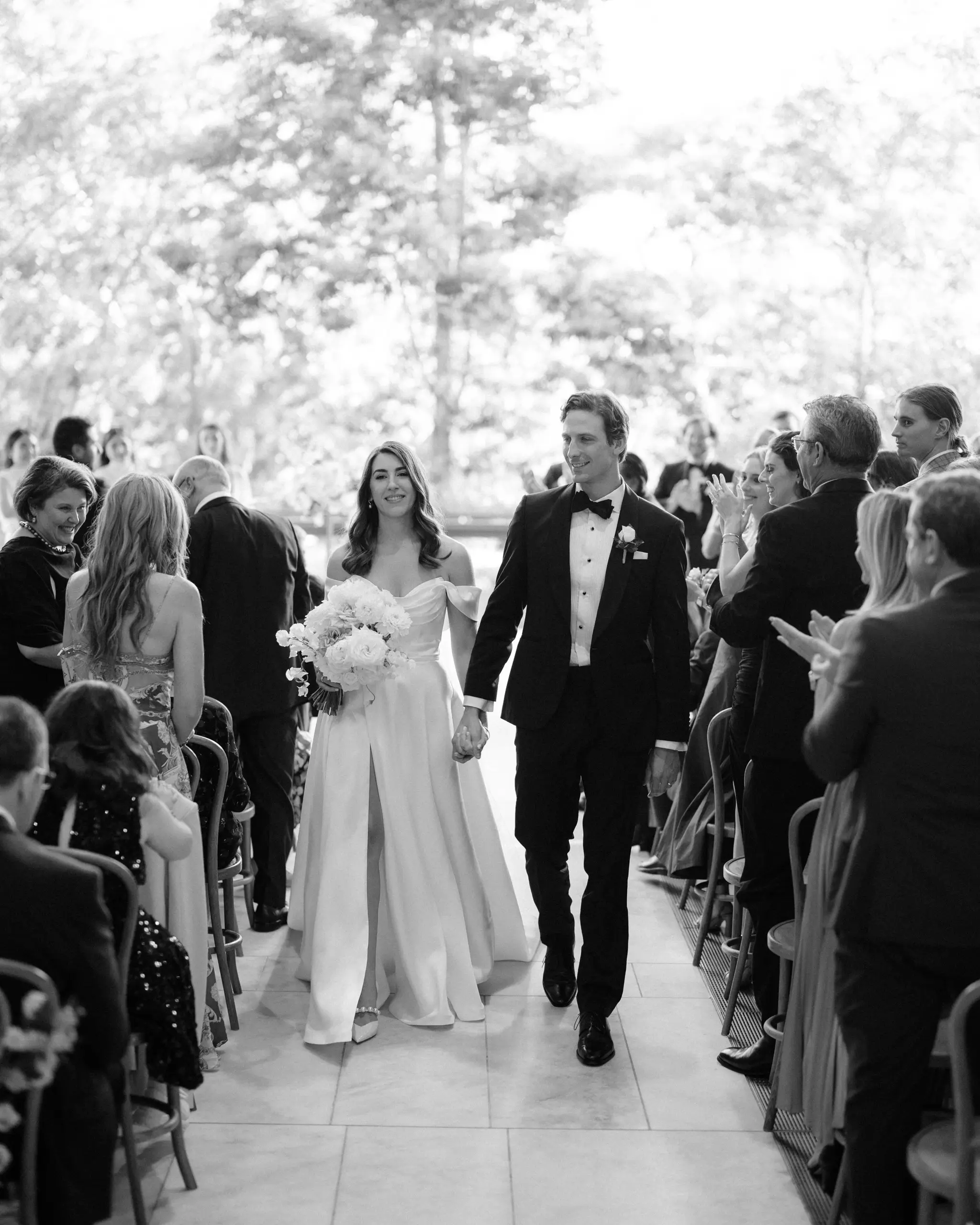 Walking down the aisle through the applause