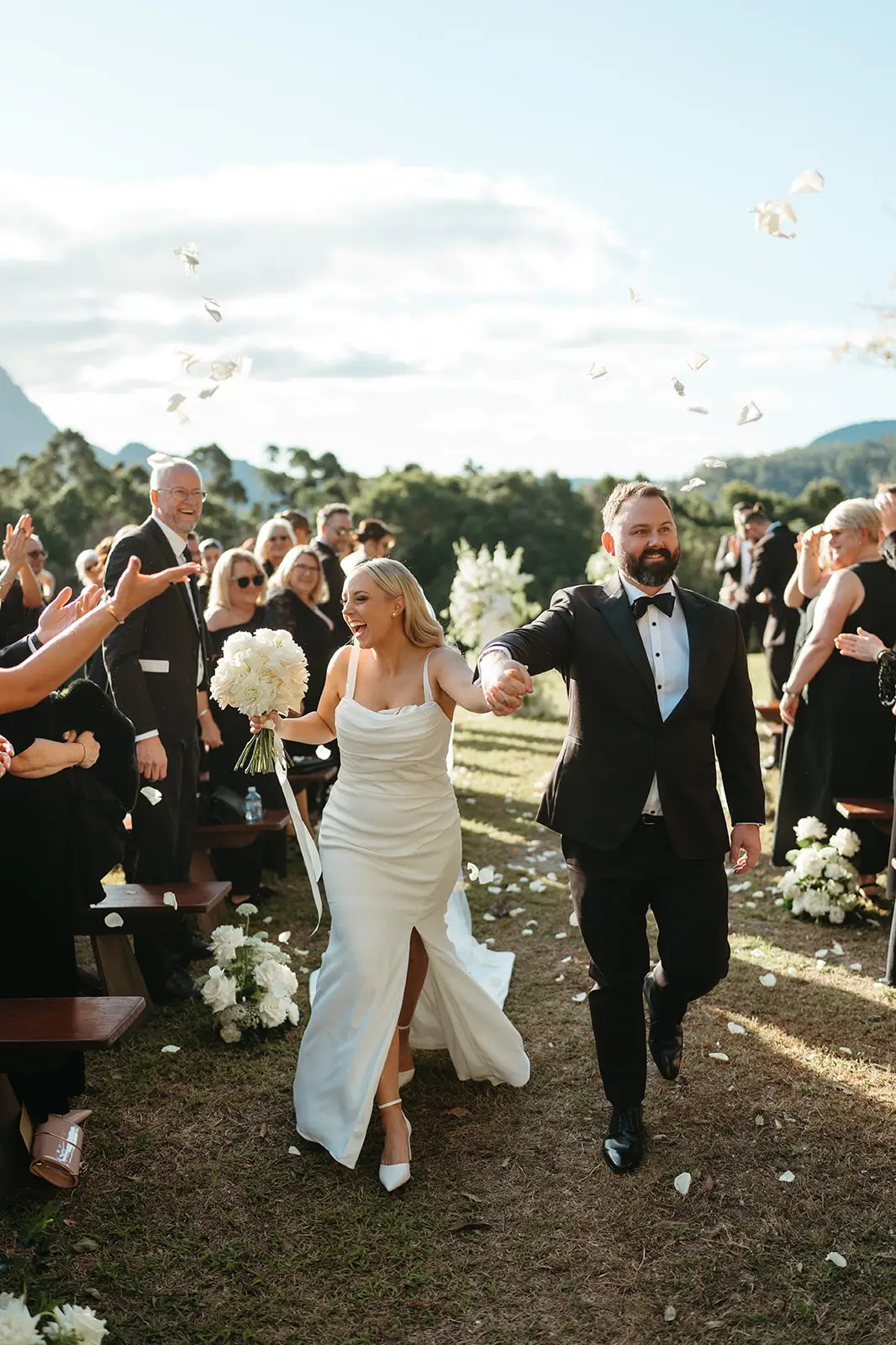 Confetti as the couple come back down the aisle, The Bower Estate