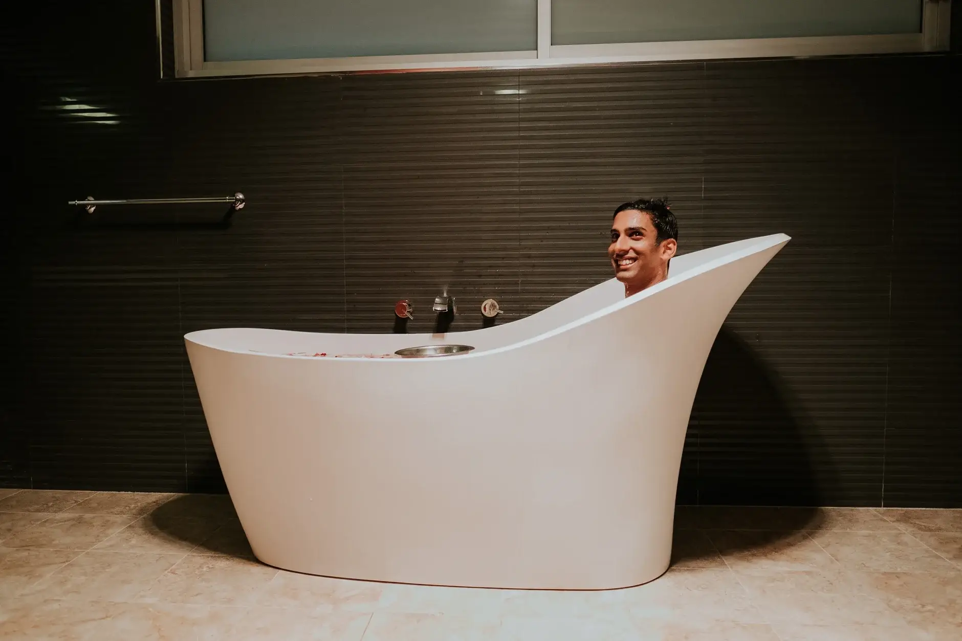 Brahman sitting in the bath after the ceremonial washing, Sydney