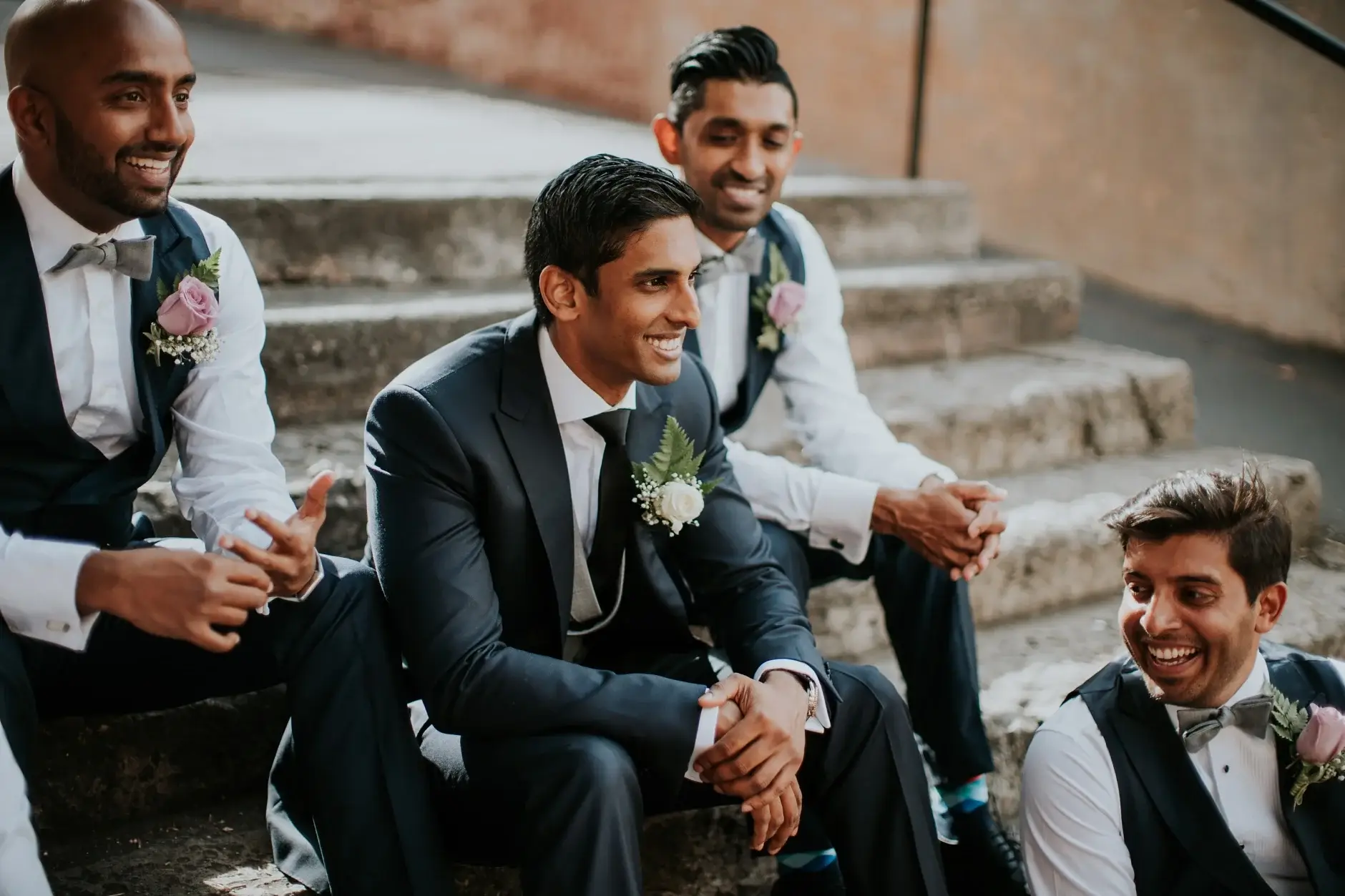 The groomsmen laughing on the steps, Sydney