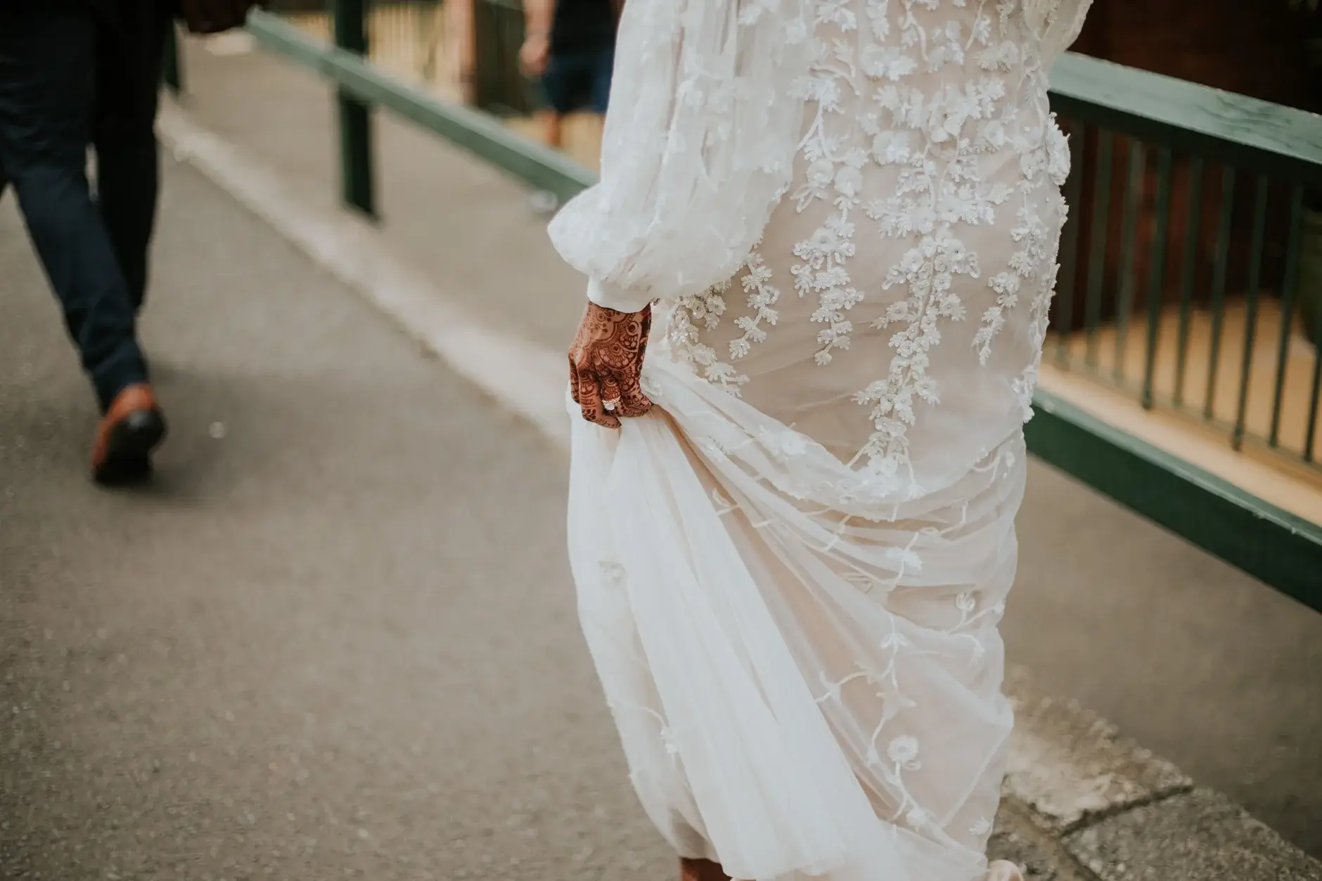 Priyanka lifting her lace gown as they walk, Sydney