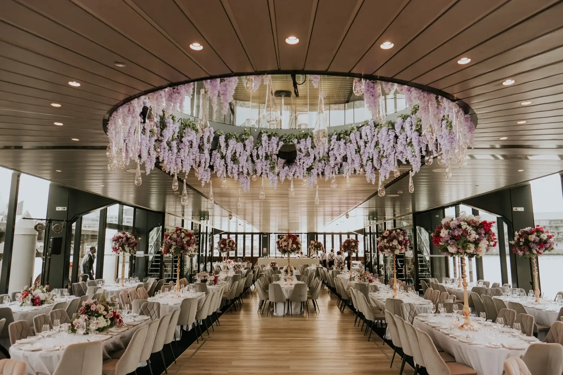The reception room with wisteria hanging above the aisle, Sydney