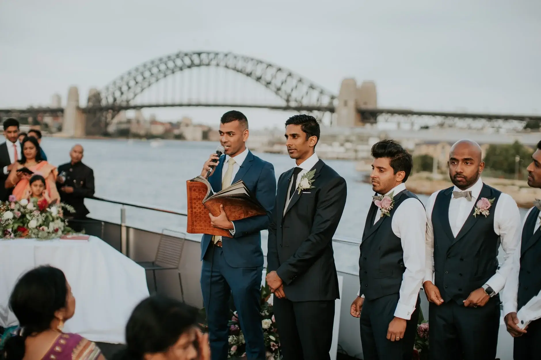 Brahman waiting with the groomsmen and the Harbour Bridge behind