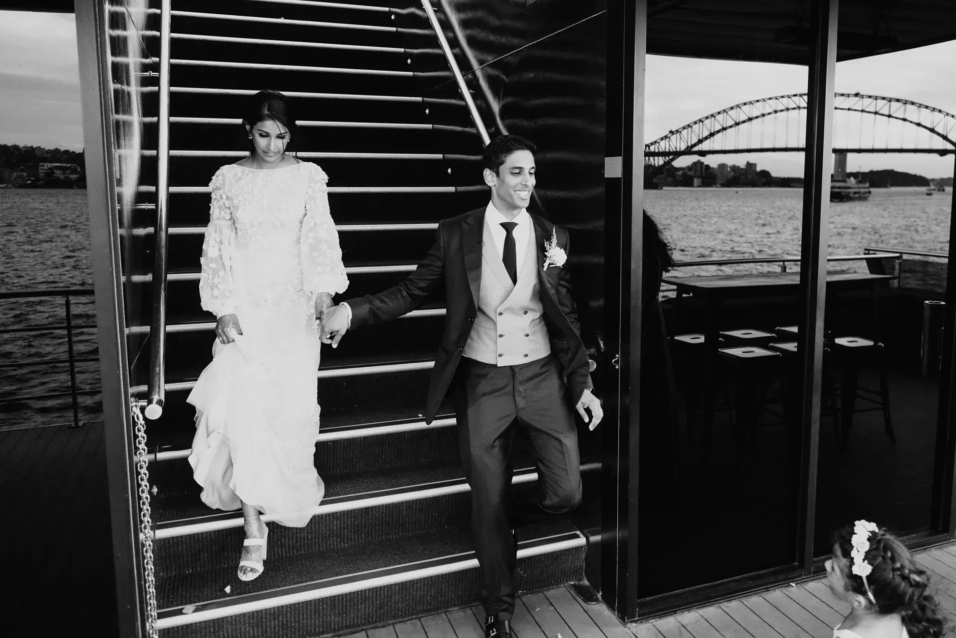 Priyanka and Brahman on the boat stairs, black and white, Sydney