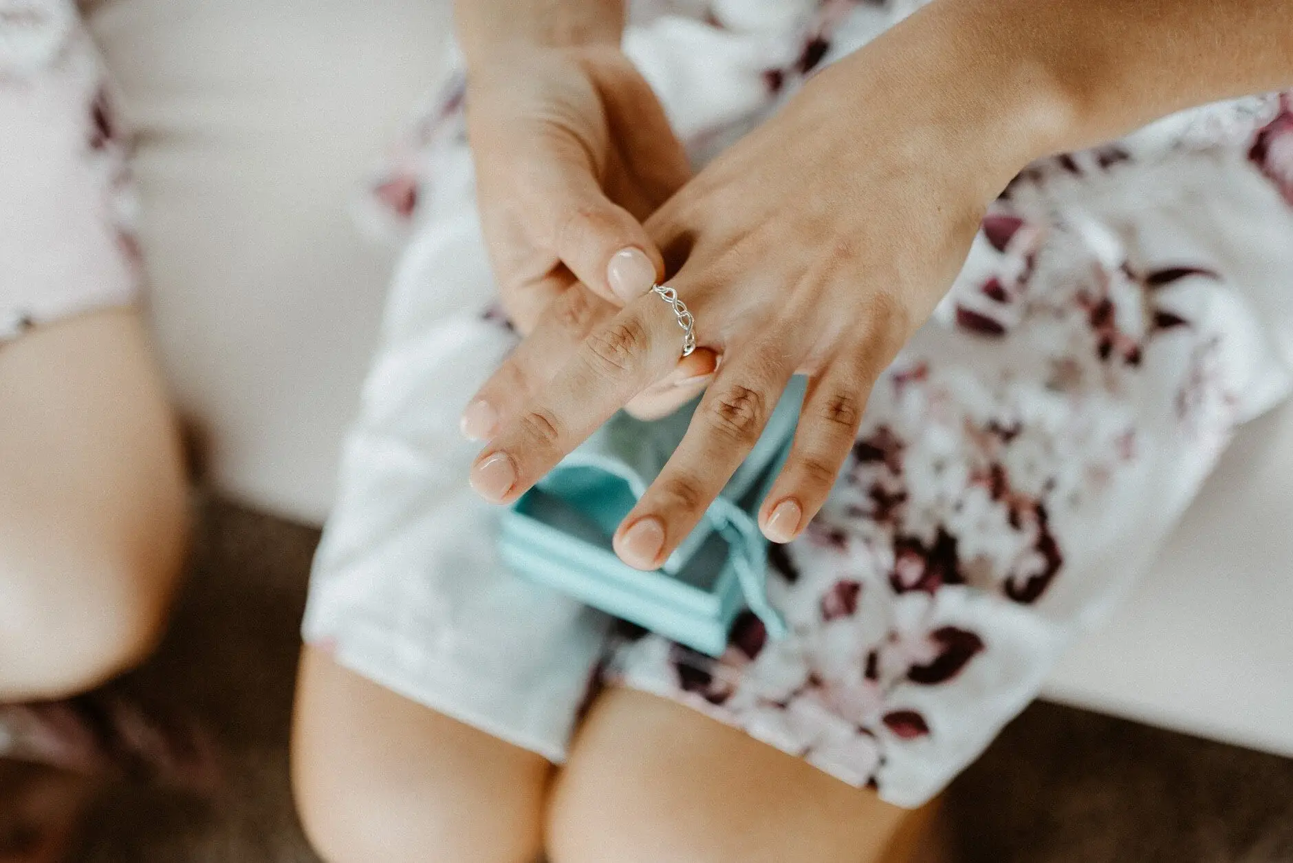 A bridesmaid unwrapping a small gift, Byron Bay