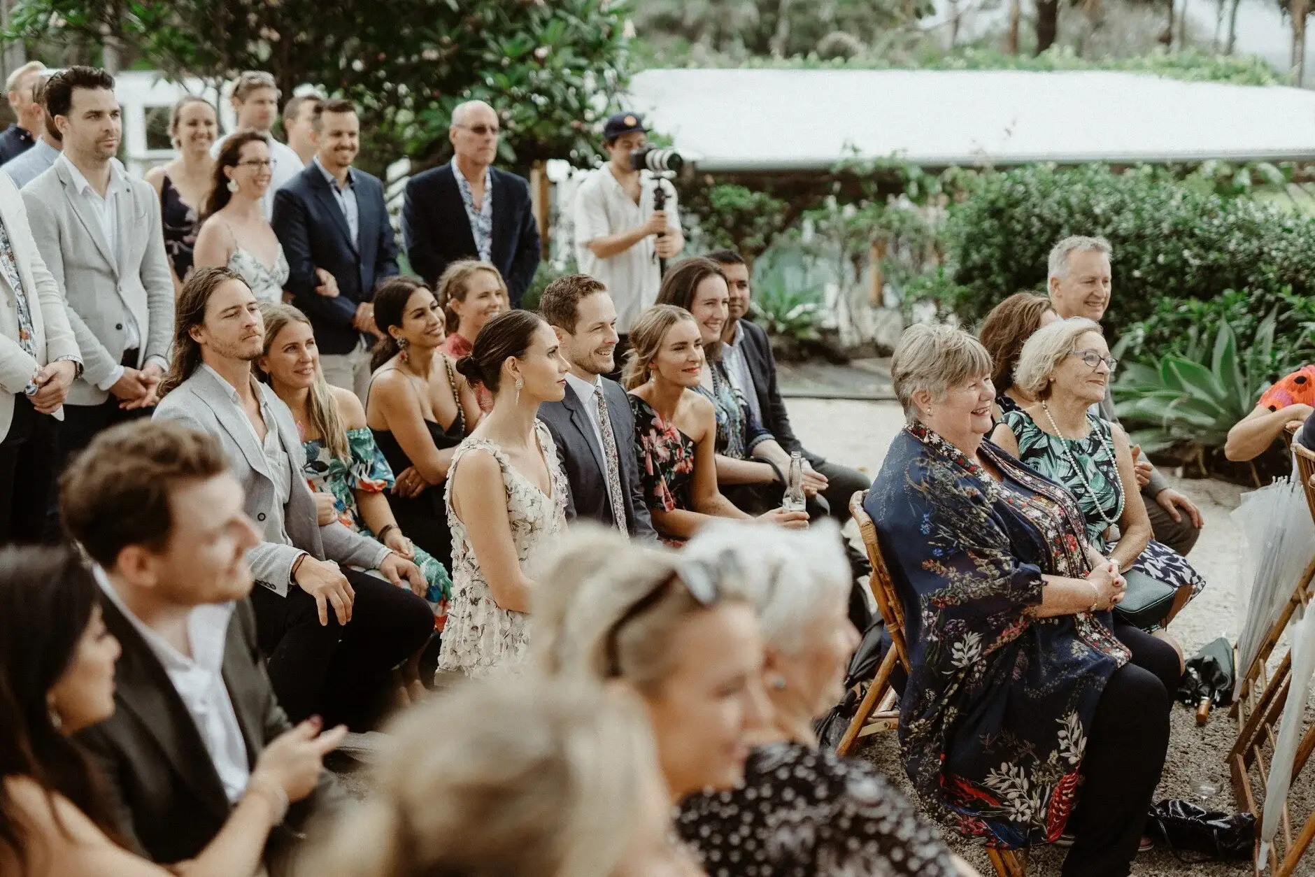Guests seated and watching from the rows of chairs, The Fig Tree Byron Bay