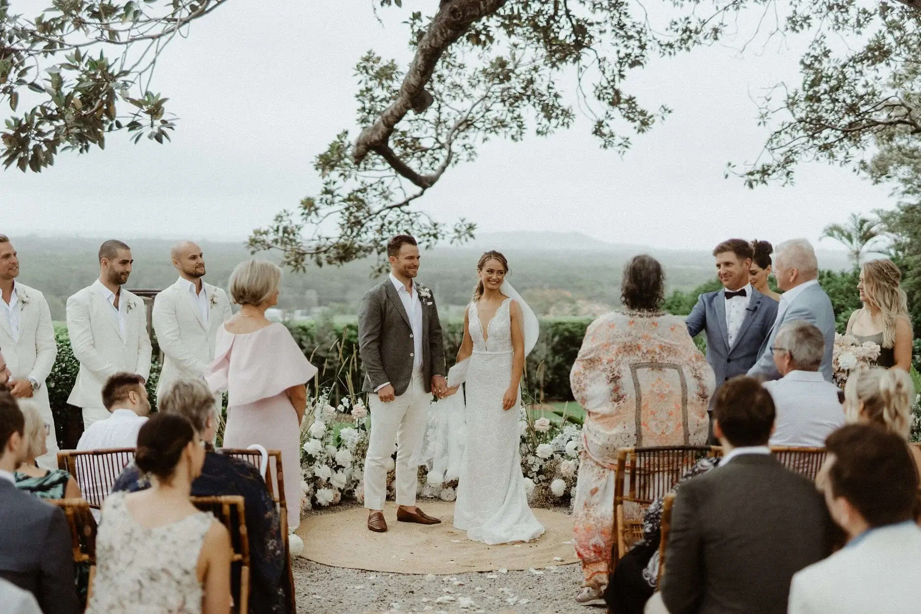 Guests standing as the ceremony begins, The Fig Tree Byron Bay
