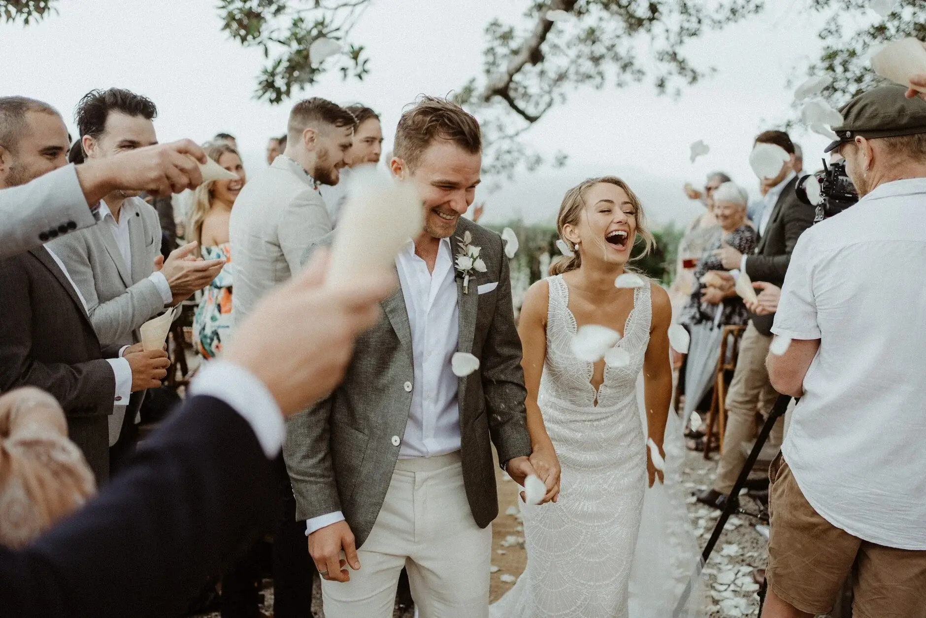 A guest reaching out to congratulate the couple, The Fig Tree Byron Bay