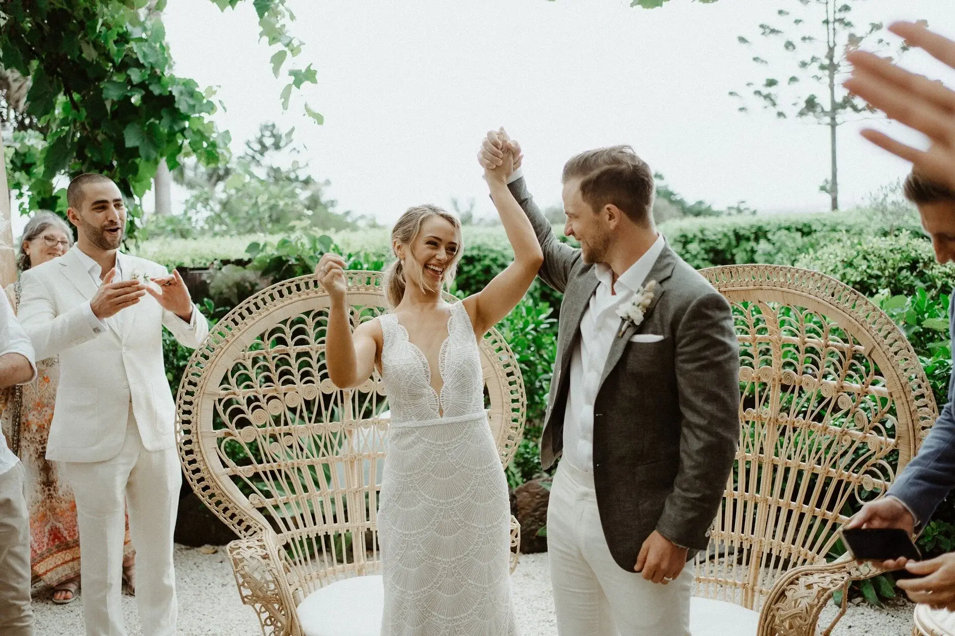 Matt greeting guests beside the hanging chair, The Fig Tree Byron Bay