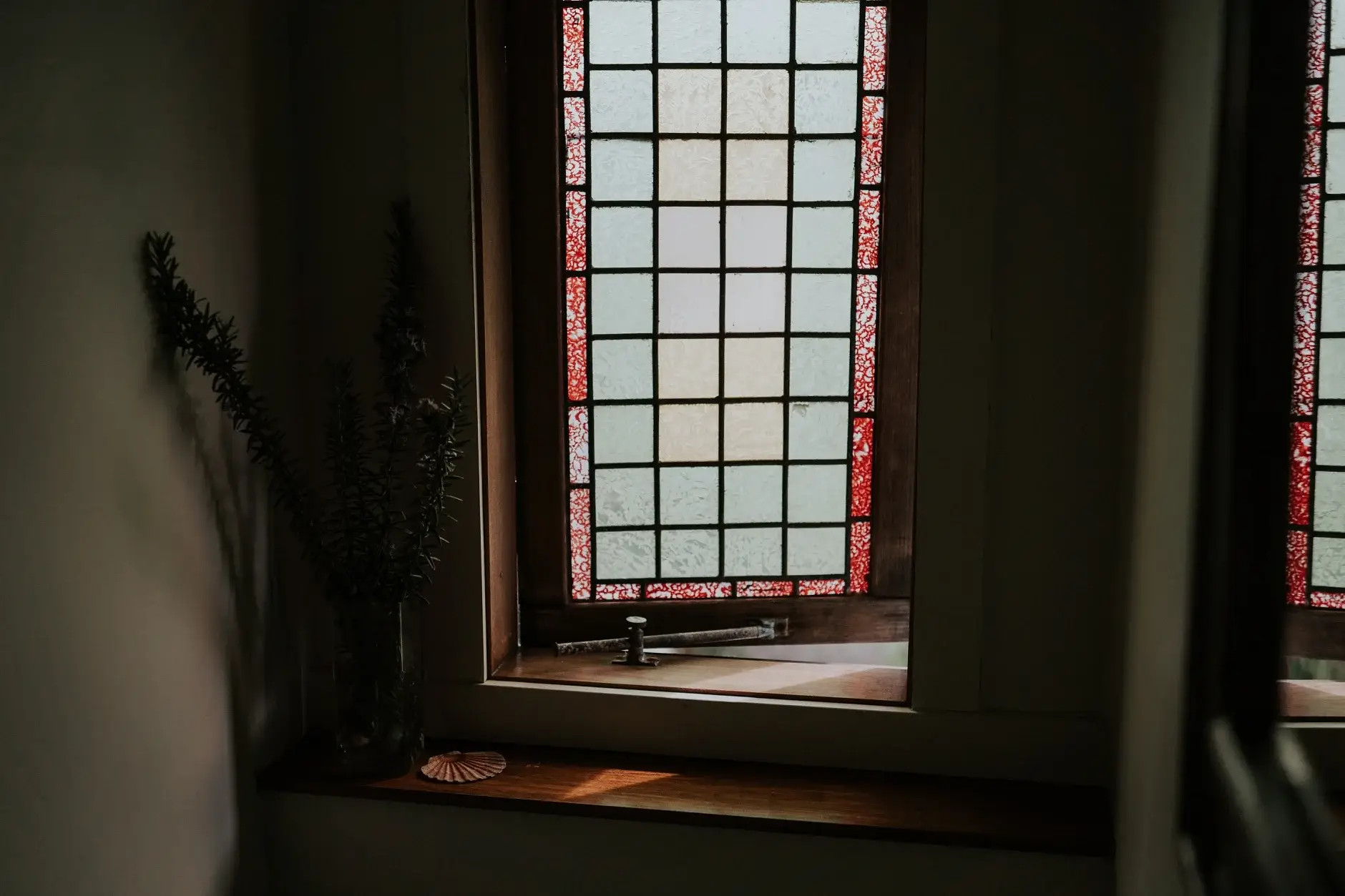 Light falling through the stained-glass window in the hallway, Belongil