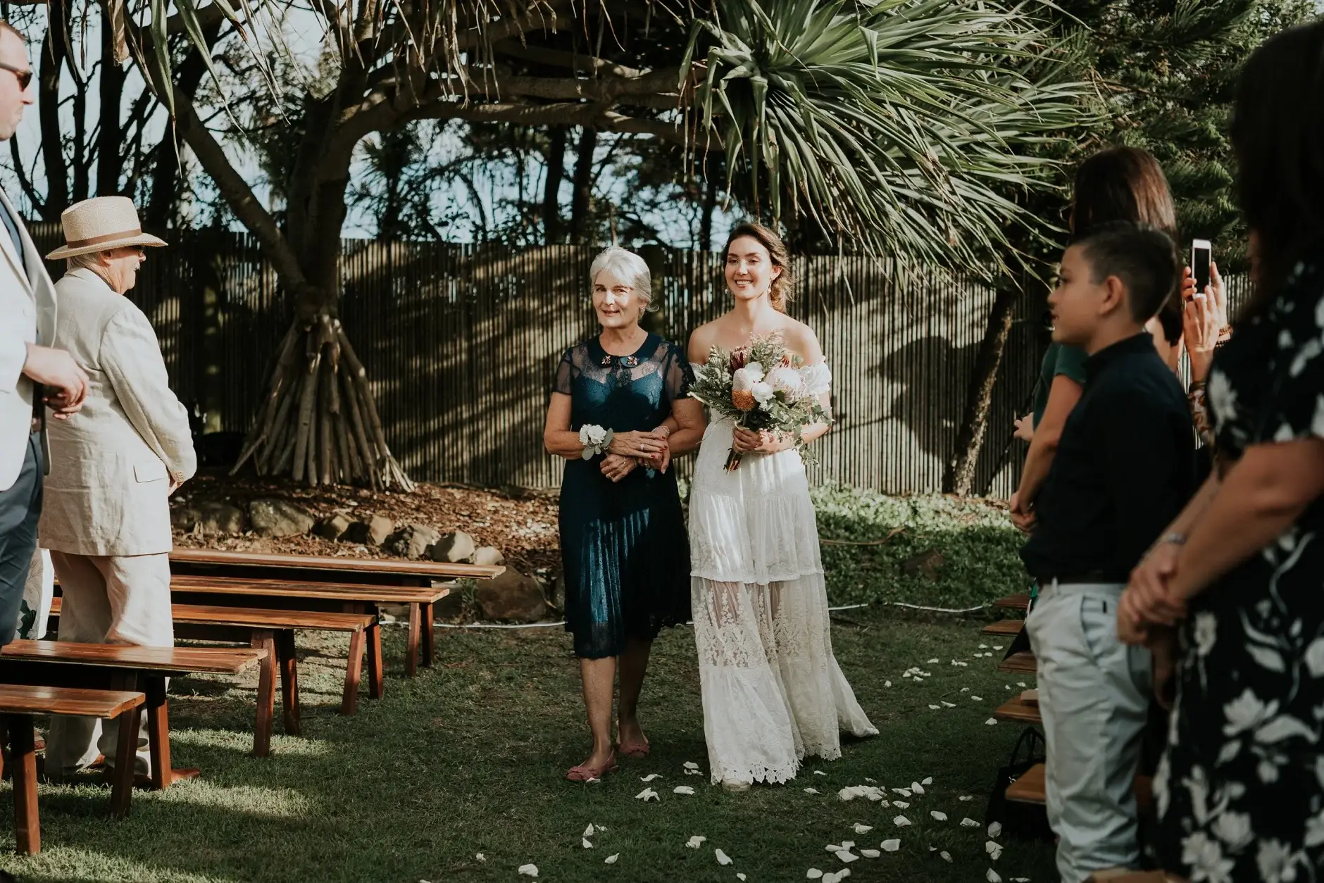 Cassie and Jack meeting at the arbour, three frames, Belongil Beach