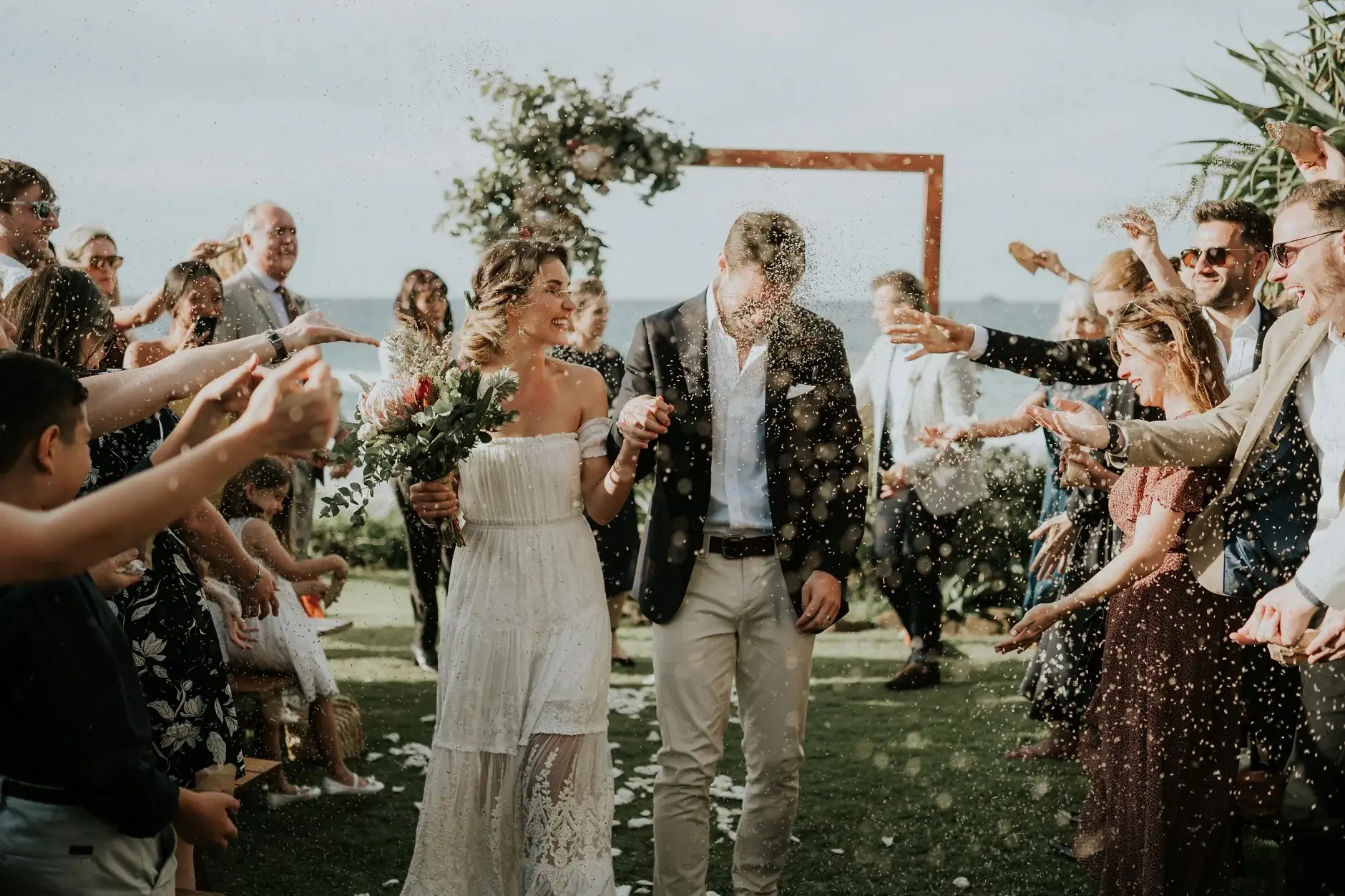 Congratulations and hugs after the ceremony, three frames, Belongil
