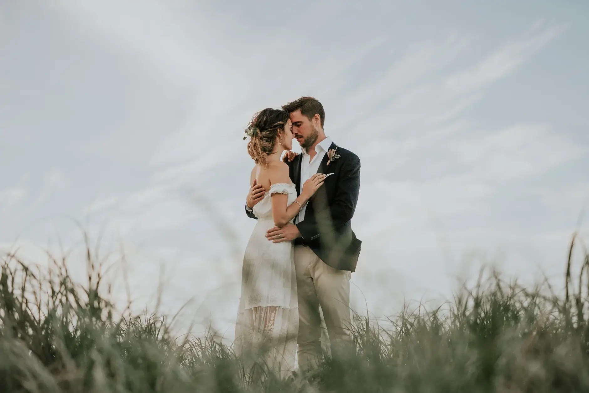 A kiss up close, and the two of them in the dunes, Belongil Beach