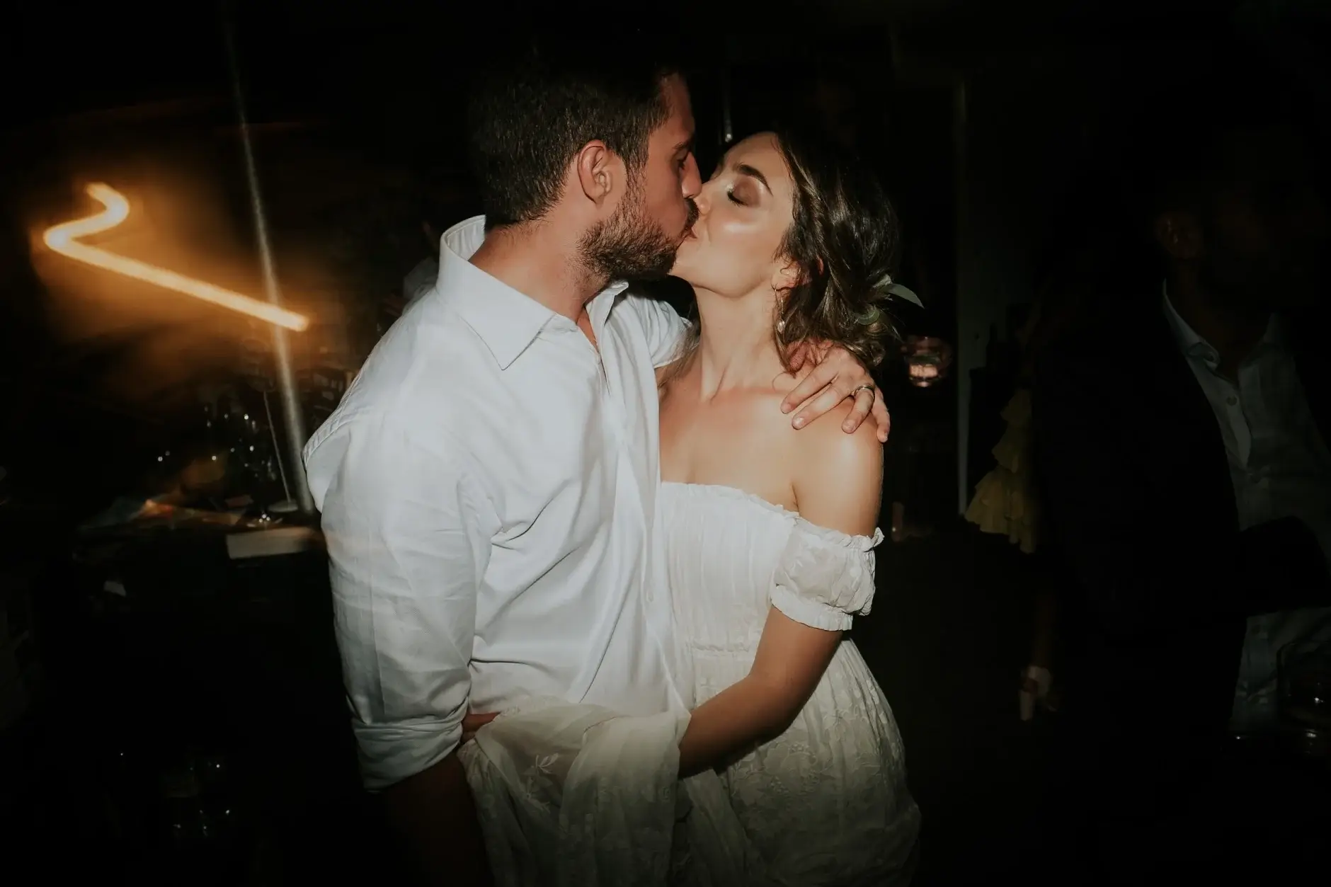 Cassie and Jack kissing on the dance floor at the end of the night