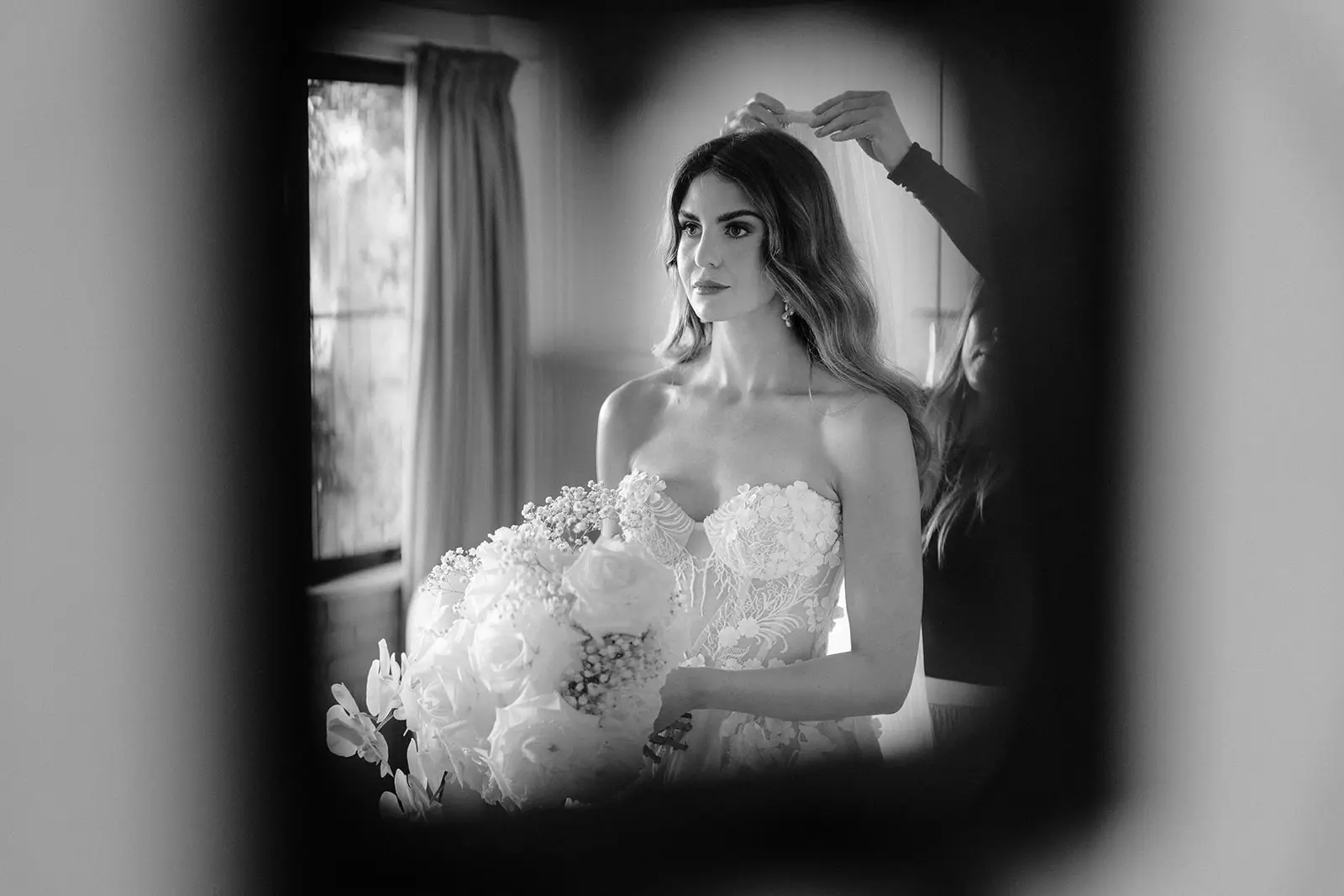 Letitia with her bouquet at the window before the ceremony, Byron Bay