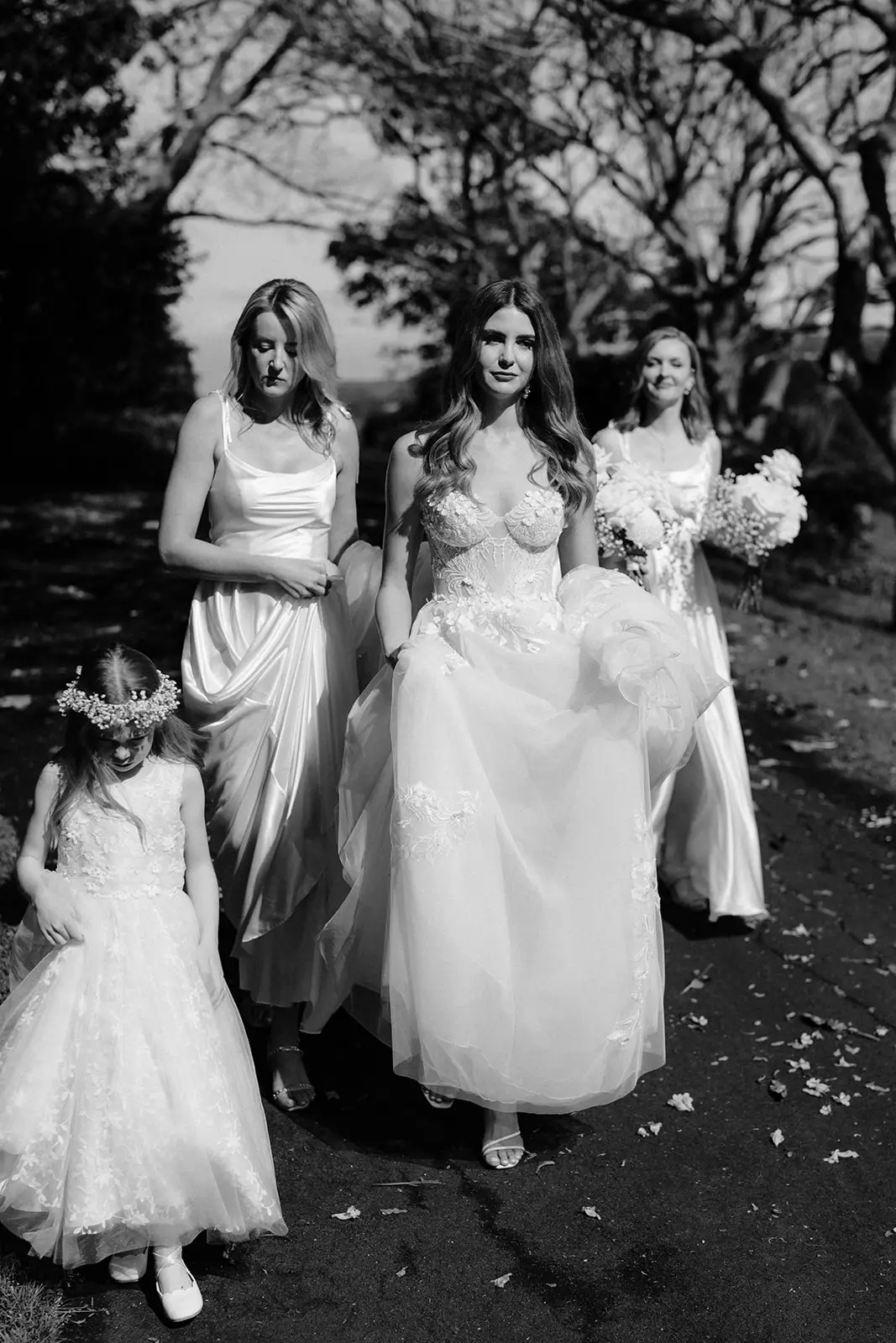 Letitia and her flower girls walking to the ceremony, Fig Tree Restaurant