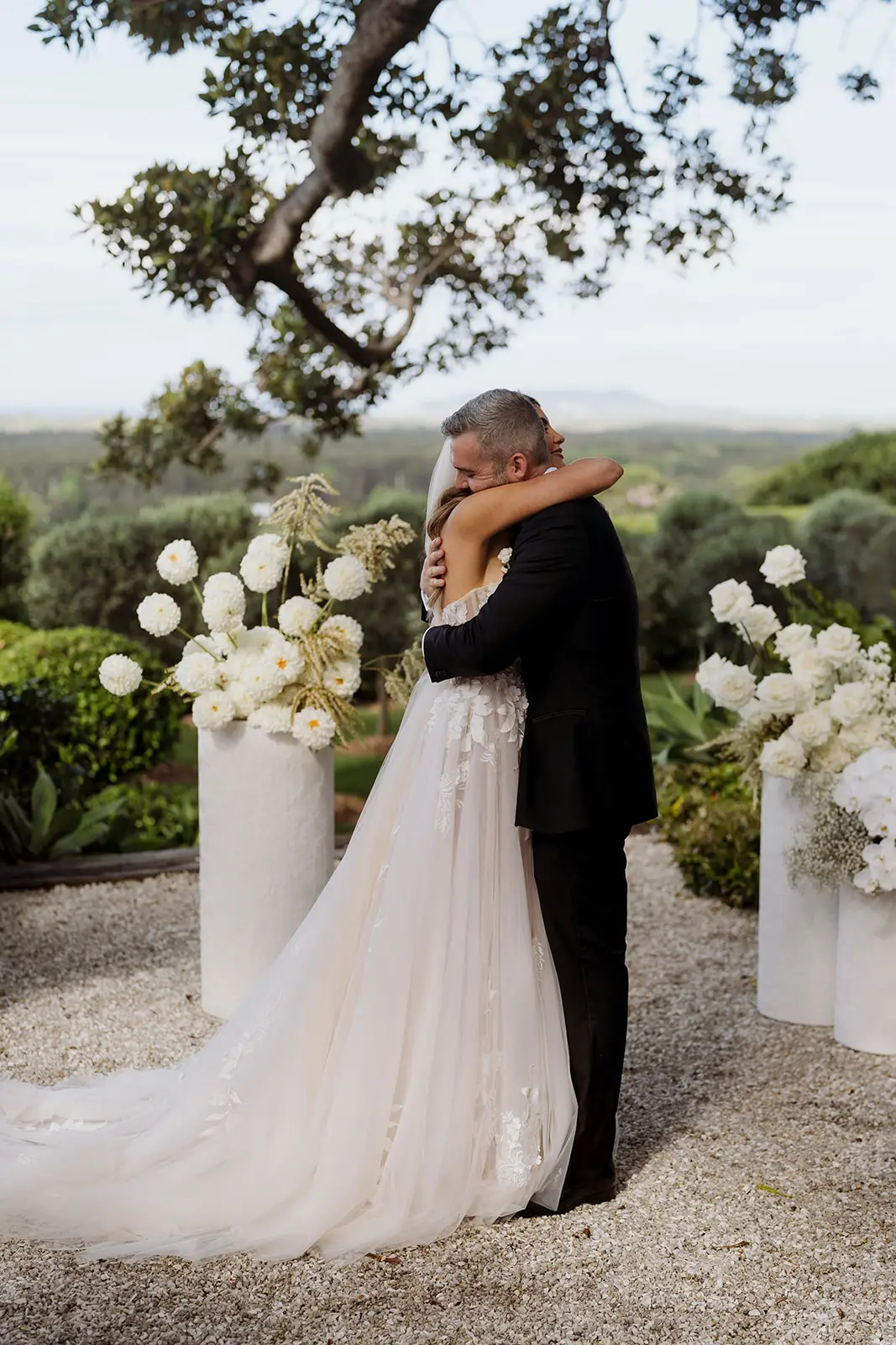 Letitia and Yoni embracing after the ceremony, Byron Bay