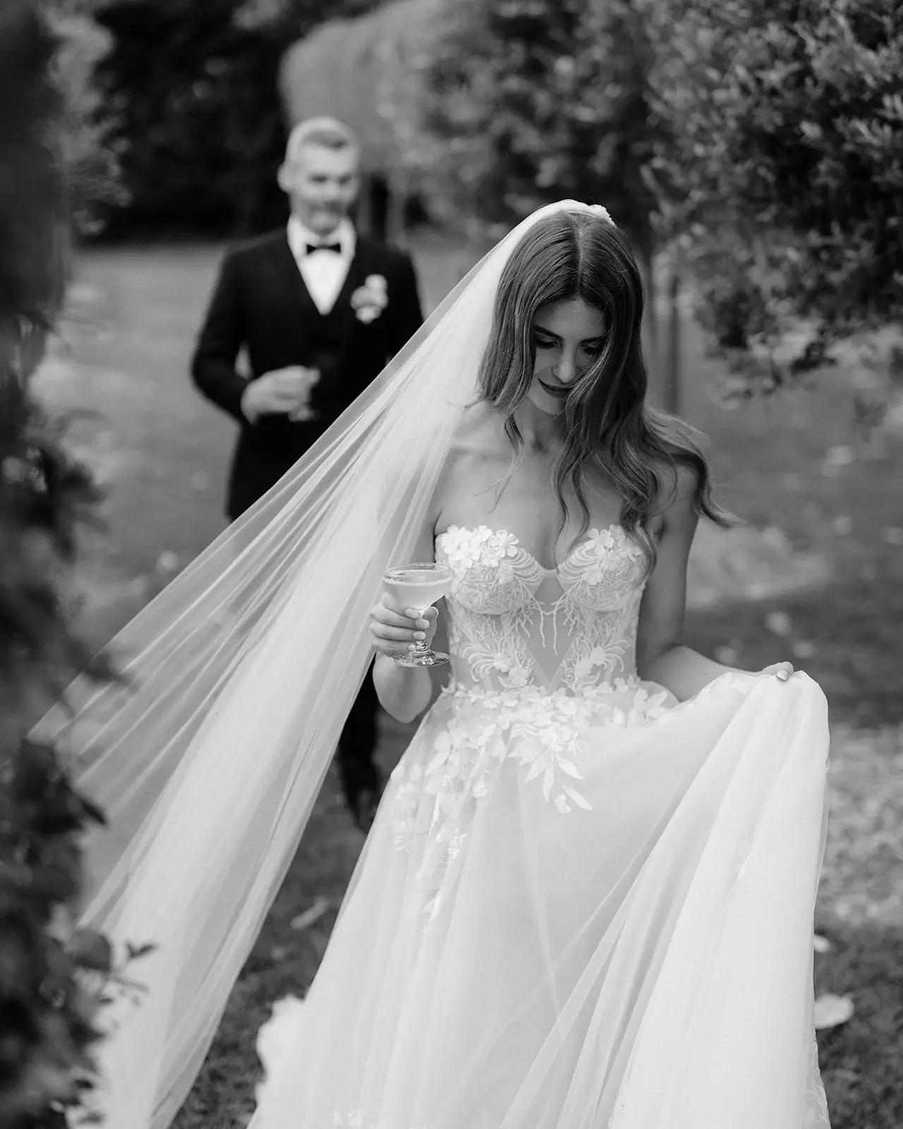 Letitia's veil trailing behind her in the garden, Byron Bay