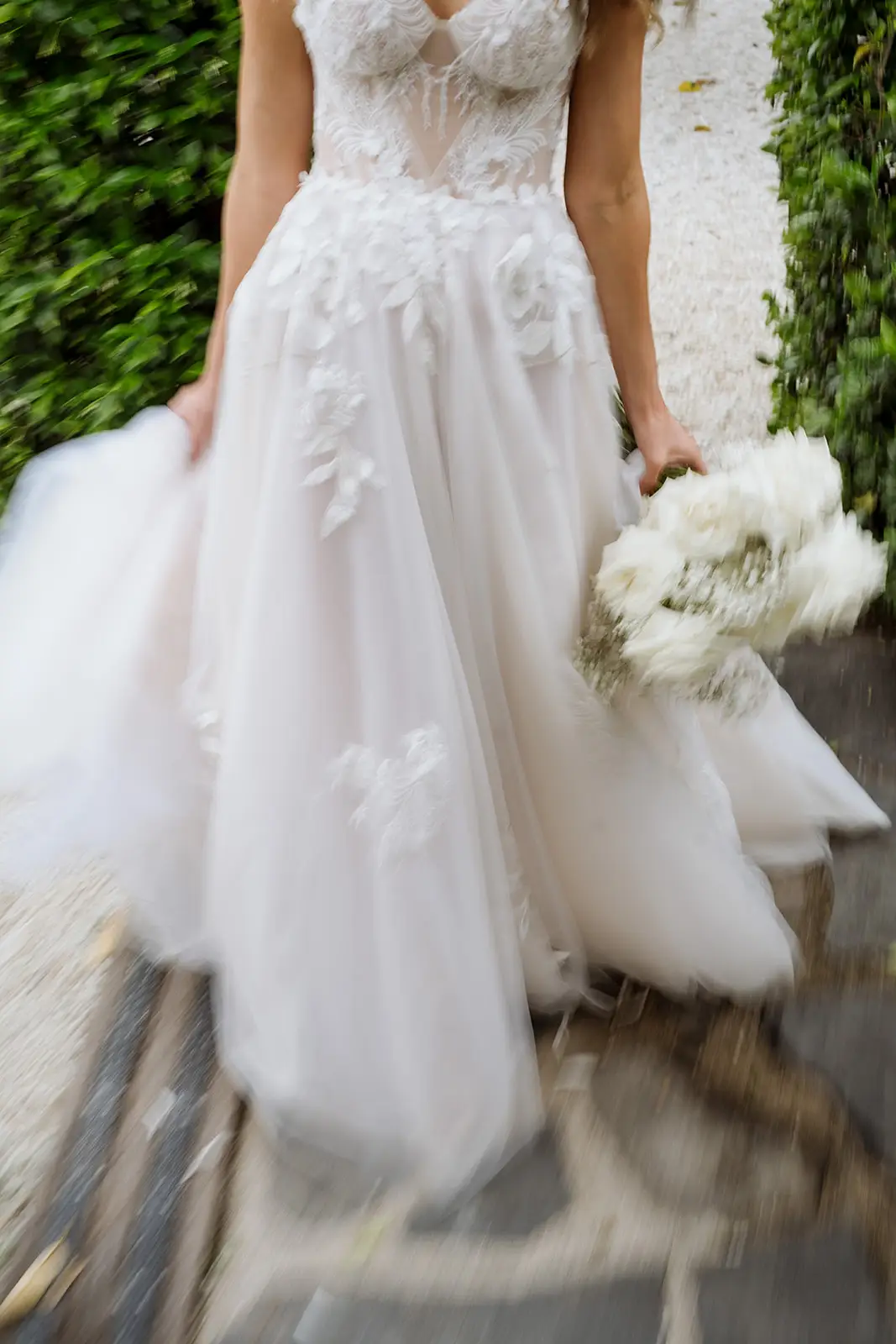 Letitia holding her bouquet, dress detail, Fig Tree Restaurant