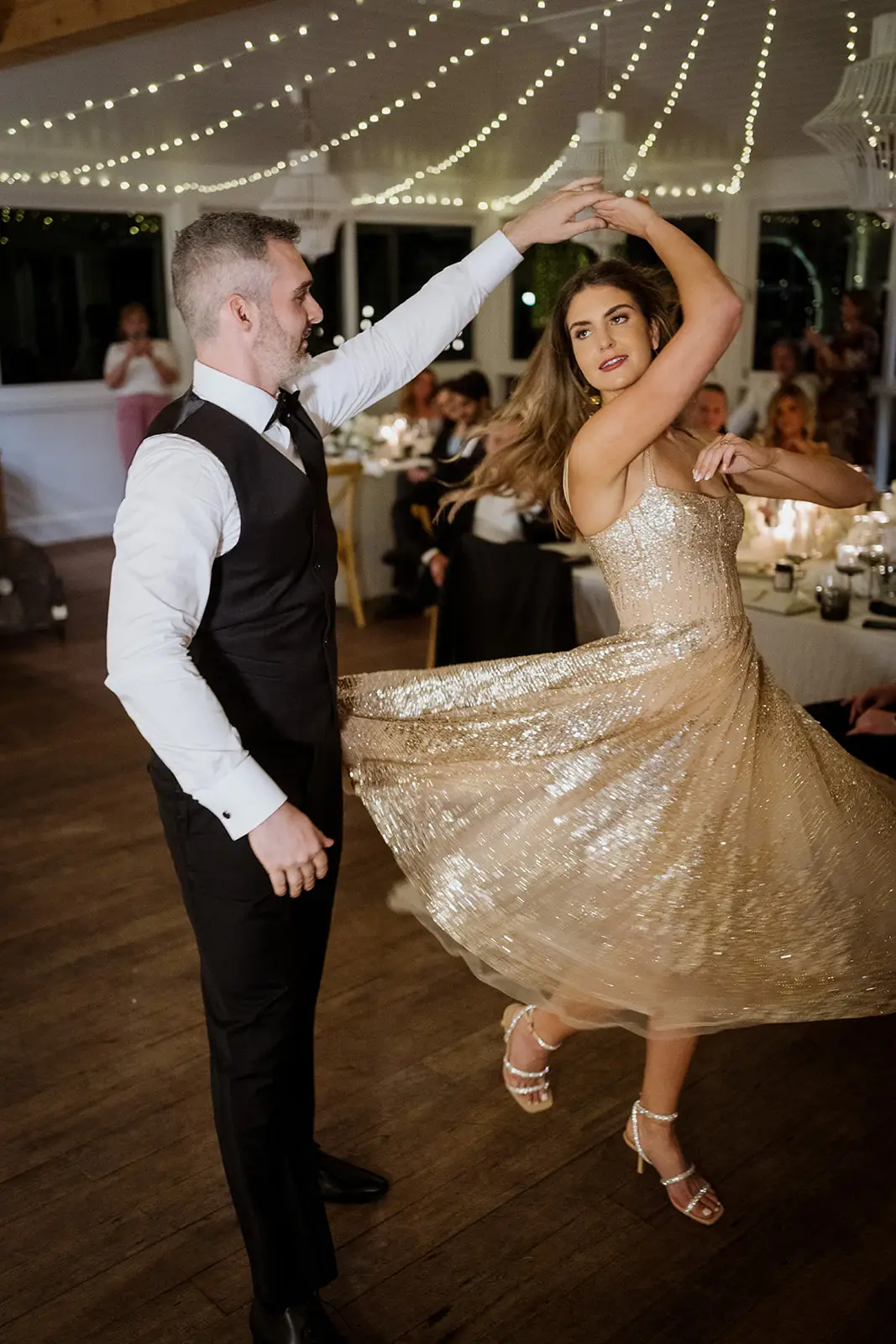 A guest spinning on the dance floor, Fig Tree Restaurant