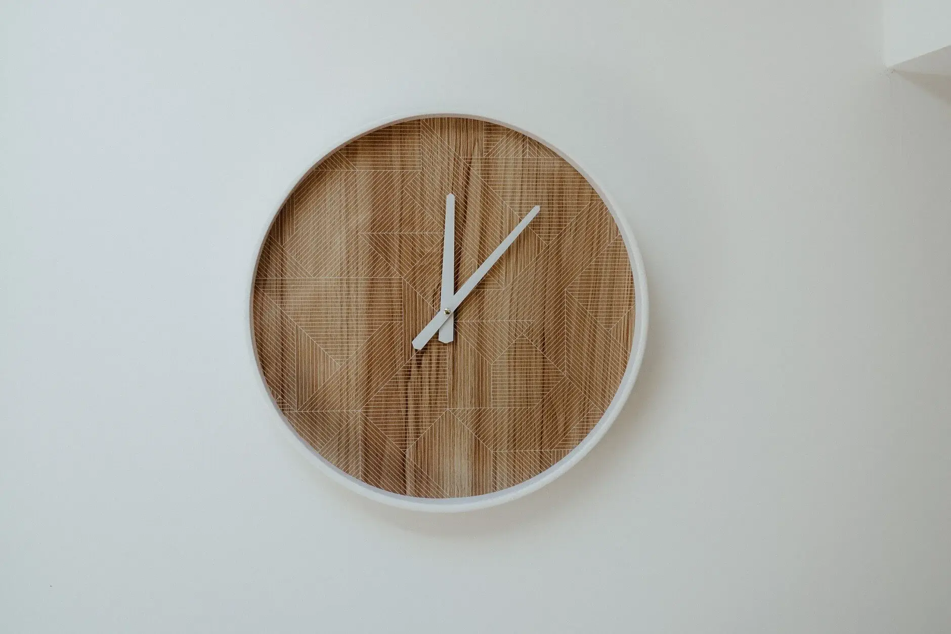 A round rattan wall clock in the house where the boys got ready, Byron Bay
