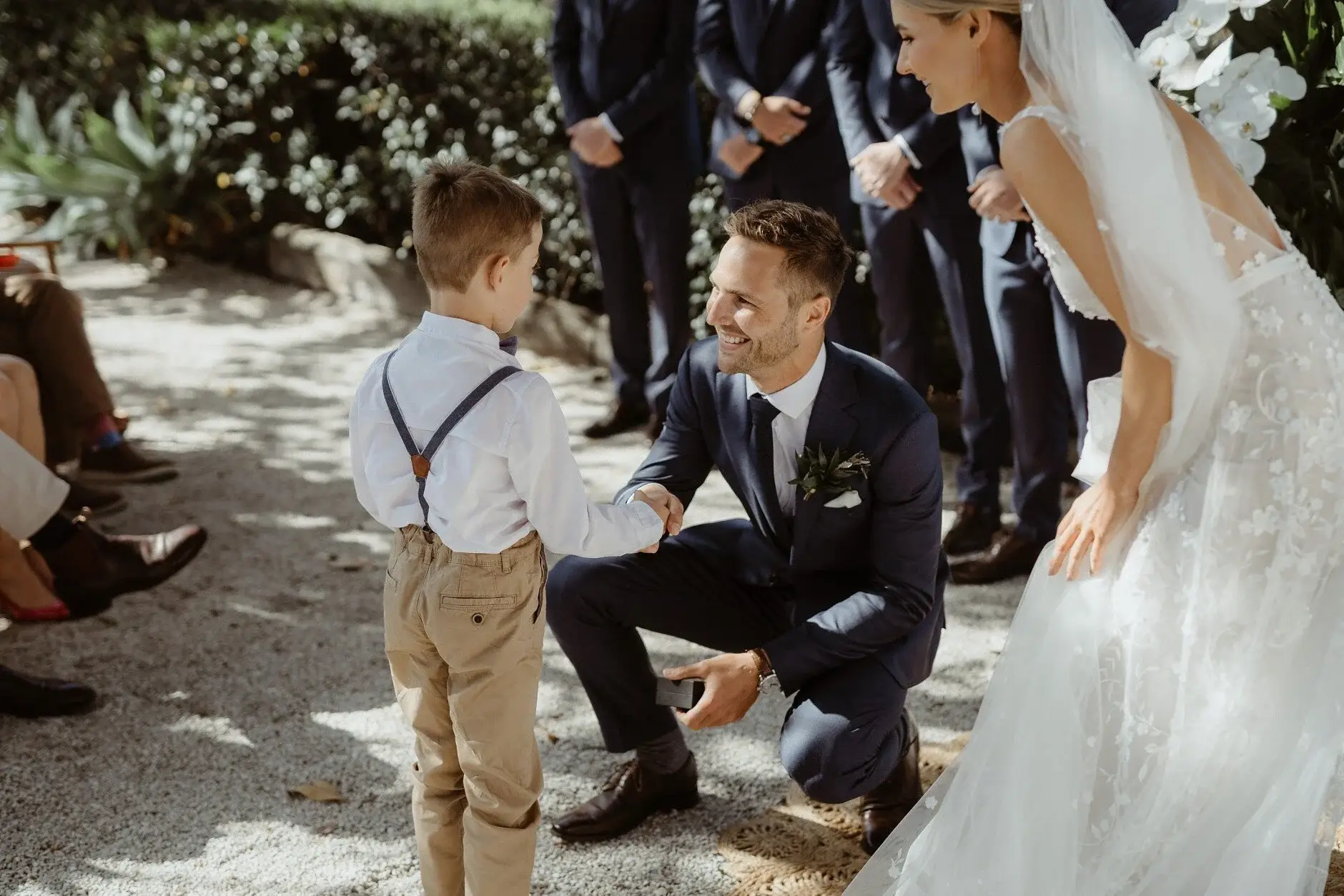 A page boy delivering the rings during the ceremony, Byron Bay
