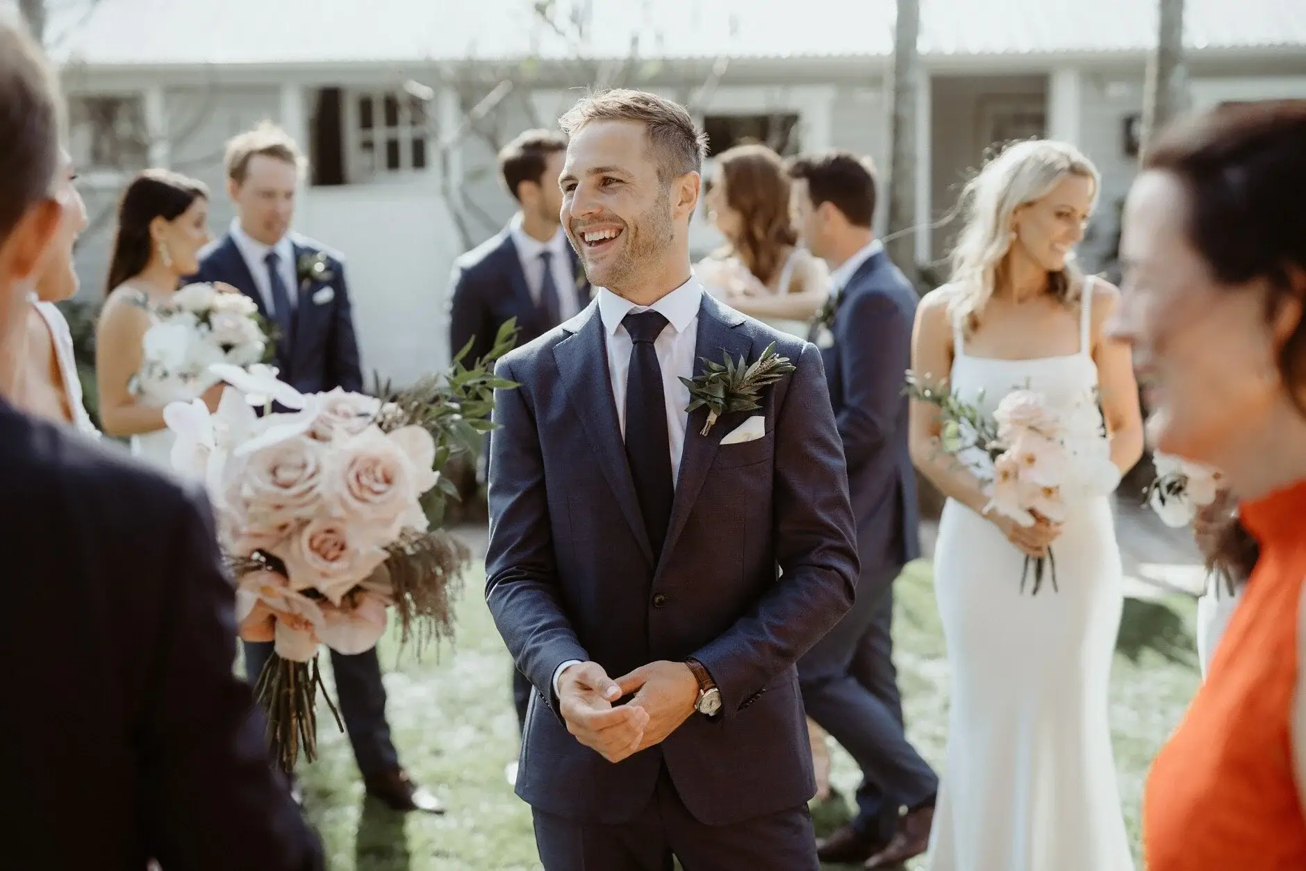 Nev greeting guests after the ceremony, Fig Tree Restaurant