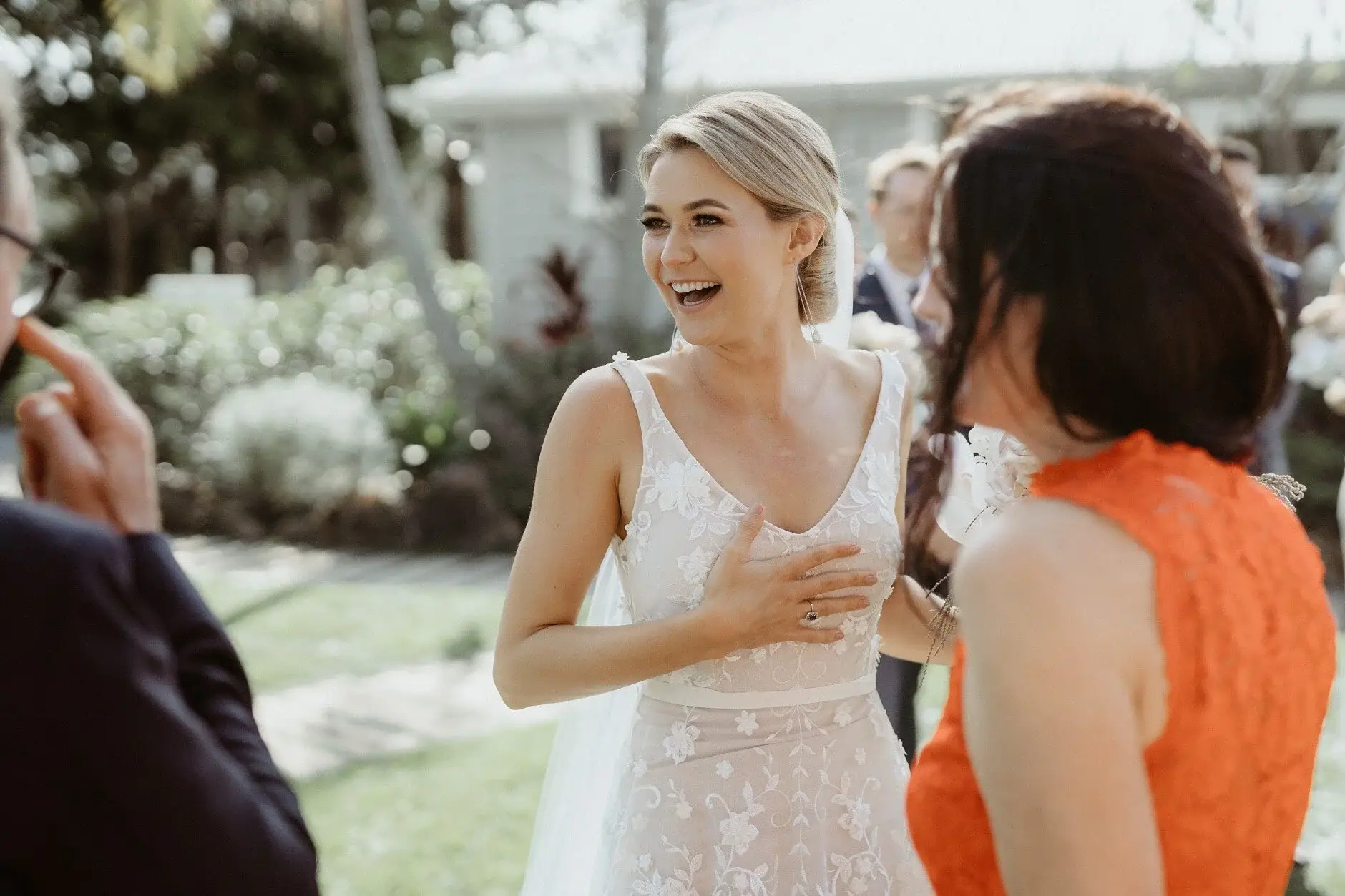 Em talking with a guest after the ceremony, Byron Bay