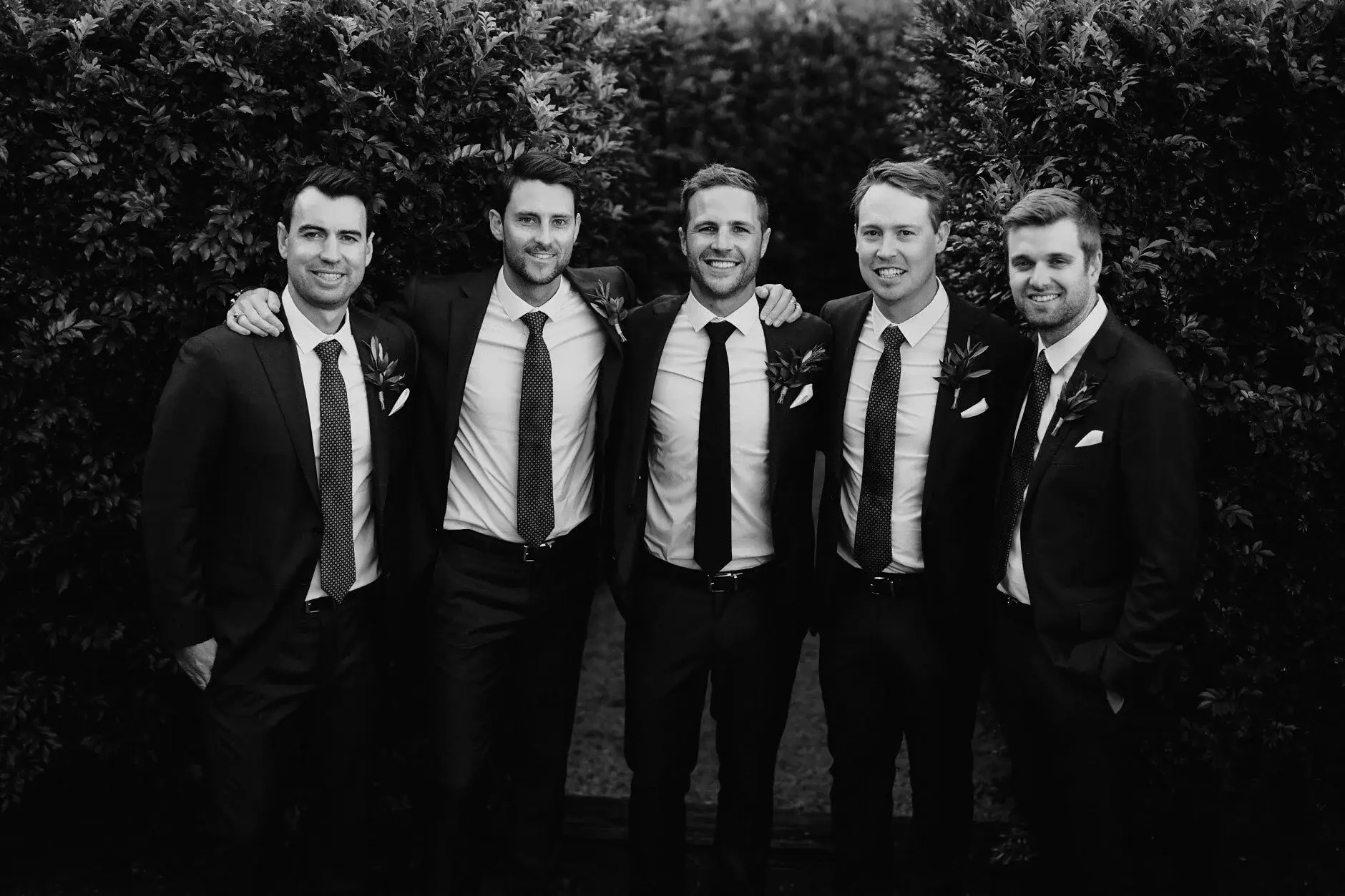 The groomsmen with ties loosened, black and white, Byron Bay