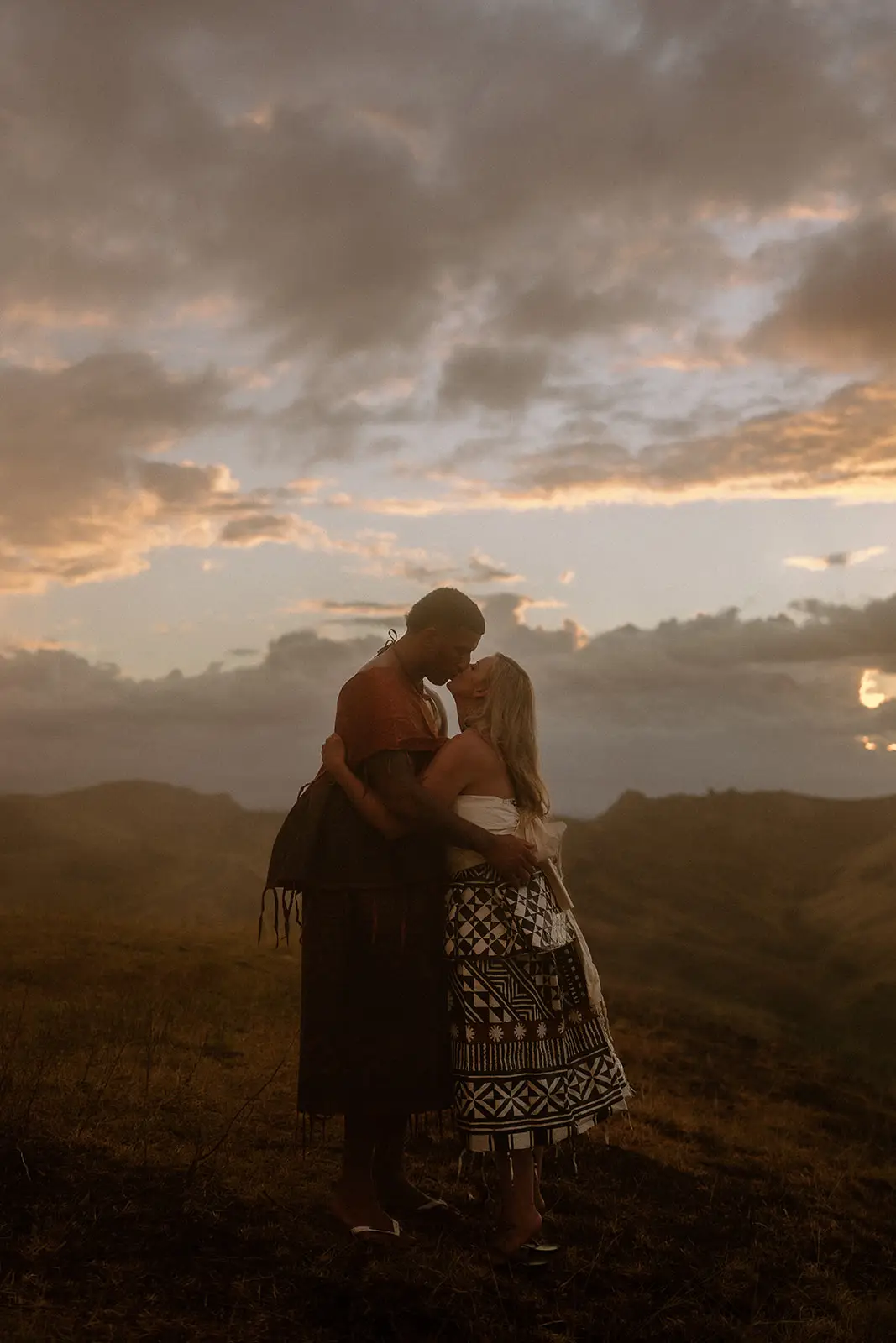 Brittany and Viliame in golden light and dust, Nausori Highlands