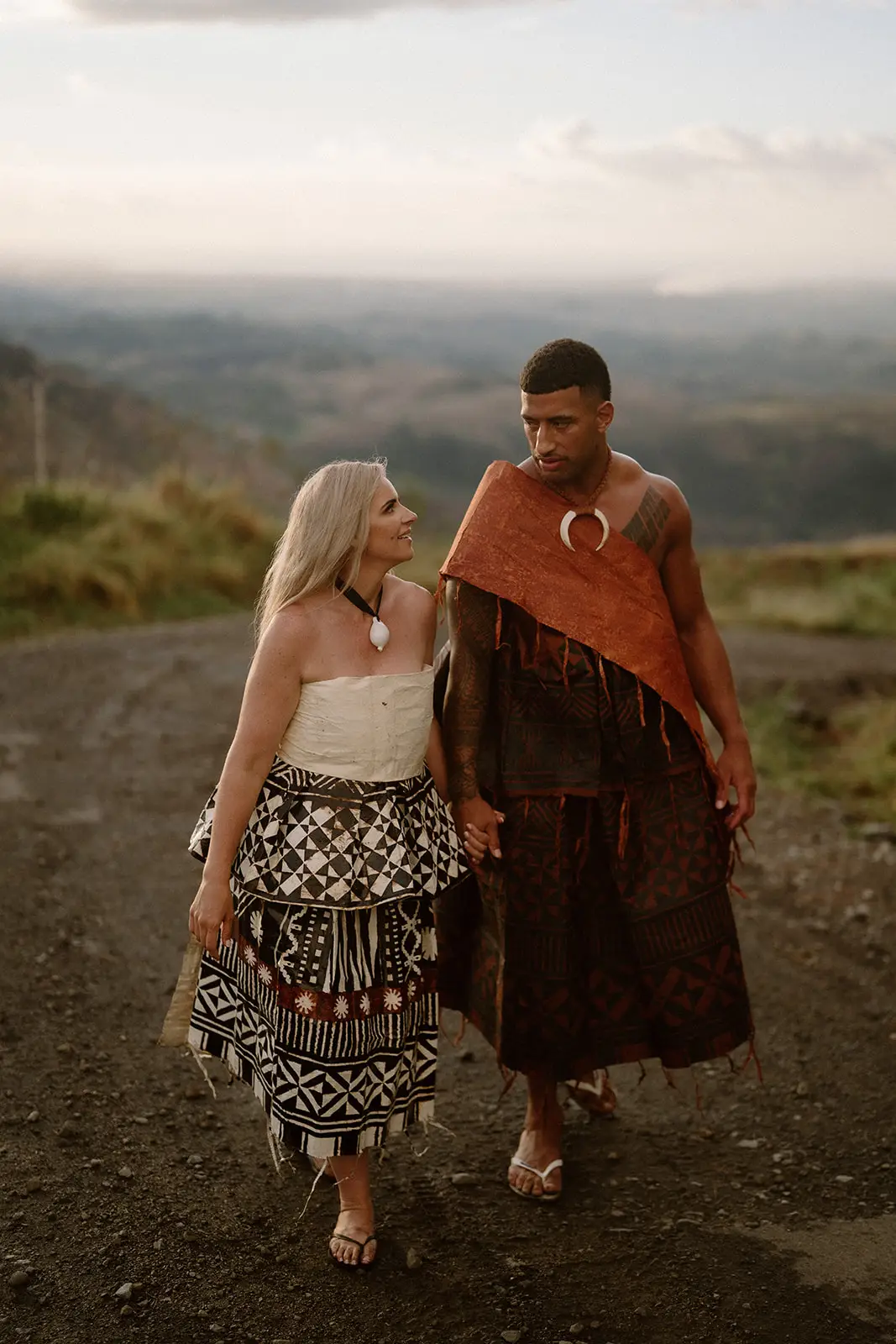 Brittany and Viliame walking together in masi, Nausori Highlands