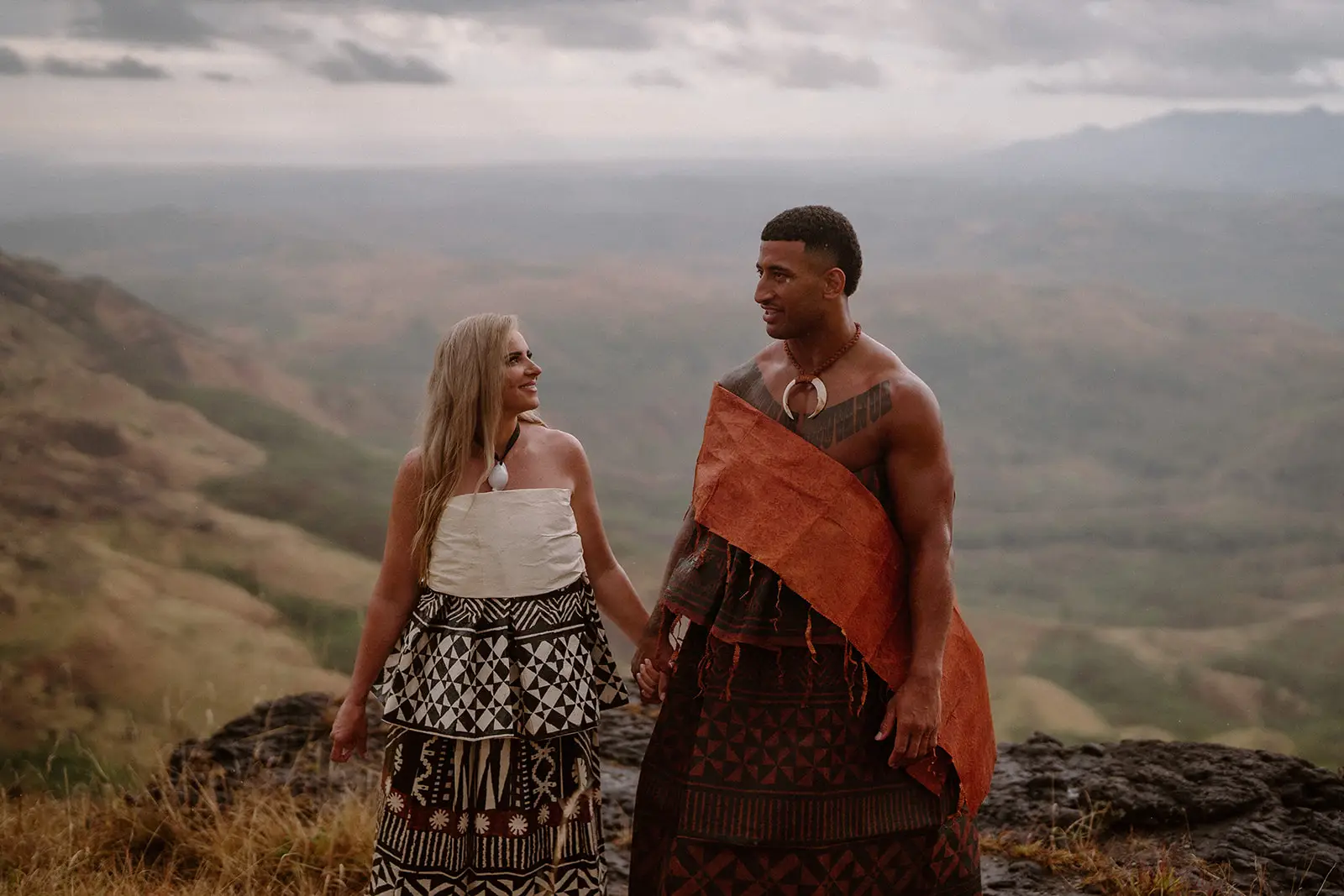 Brittany and Viliame in traditional dress among the hills, Fiji