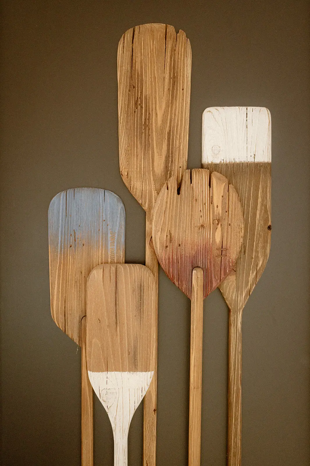Carved wooden paddles displayed at the Crowne Plaza, Nadi Bay