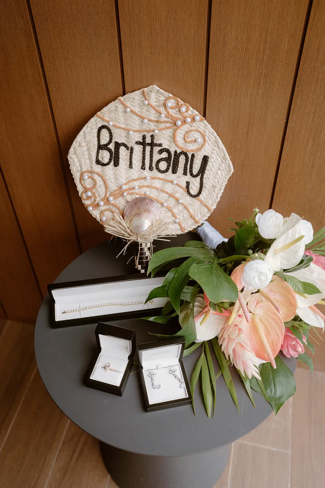 A hanging sign with Brittany's name and tropical flowers, Nadi Bay