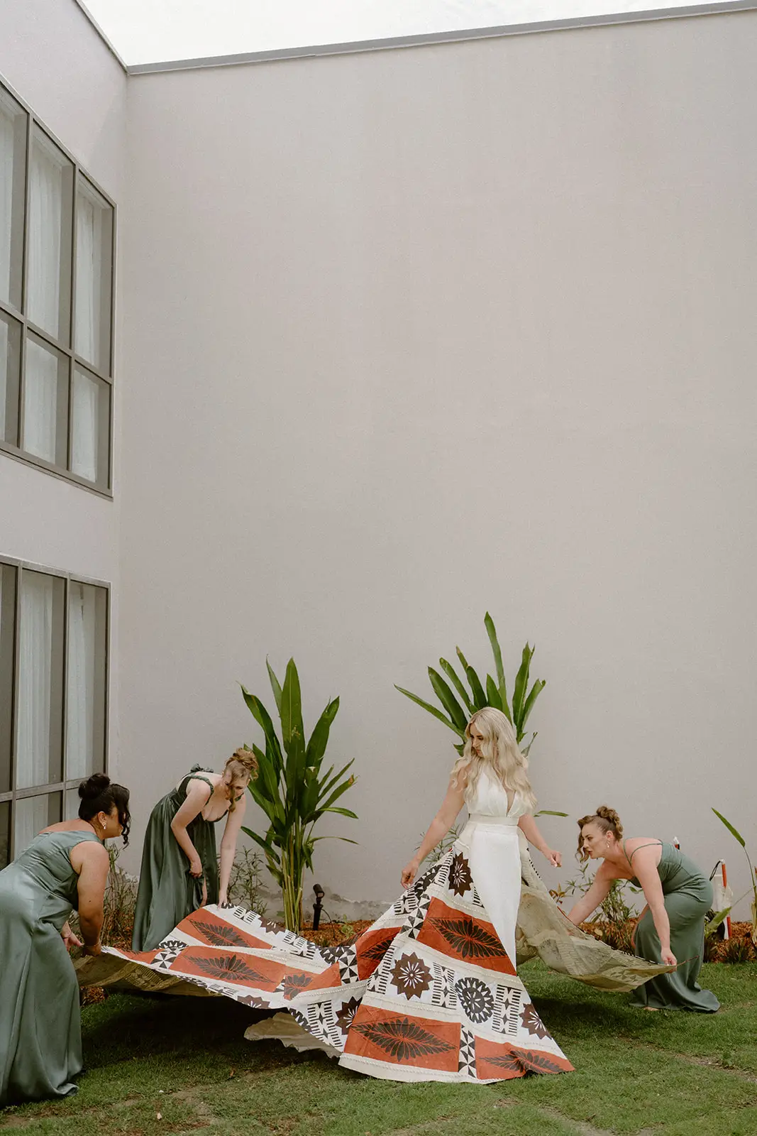 Guests waiting on the lawn before the ceremony, Nadi Bay