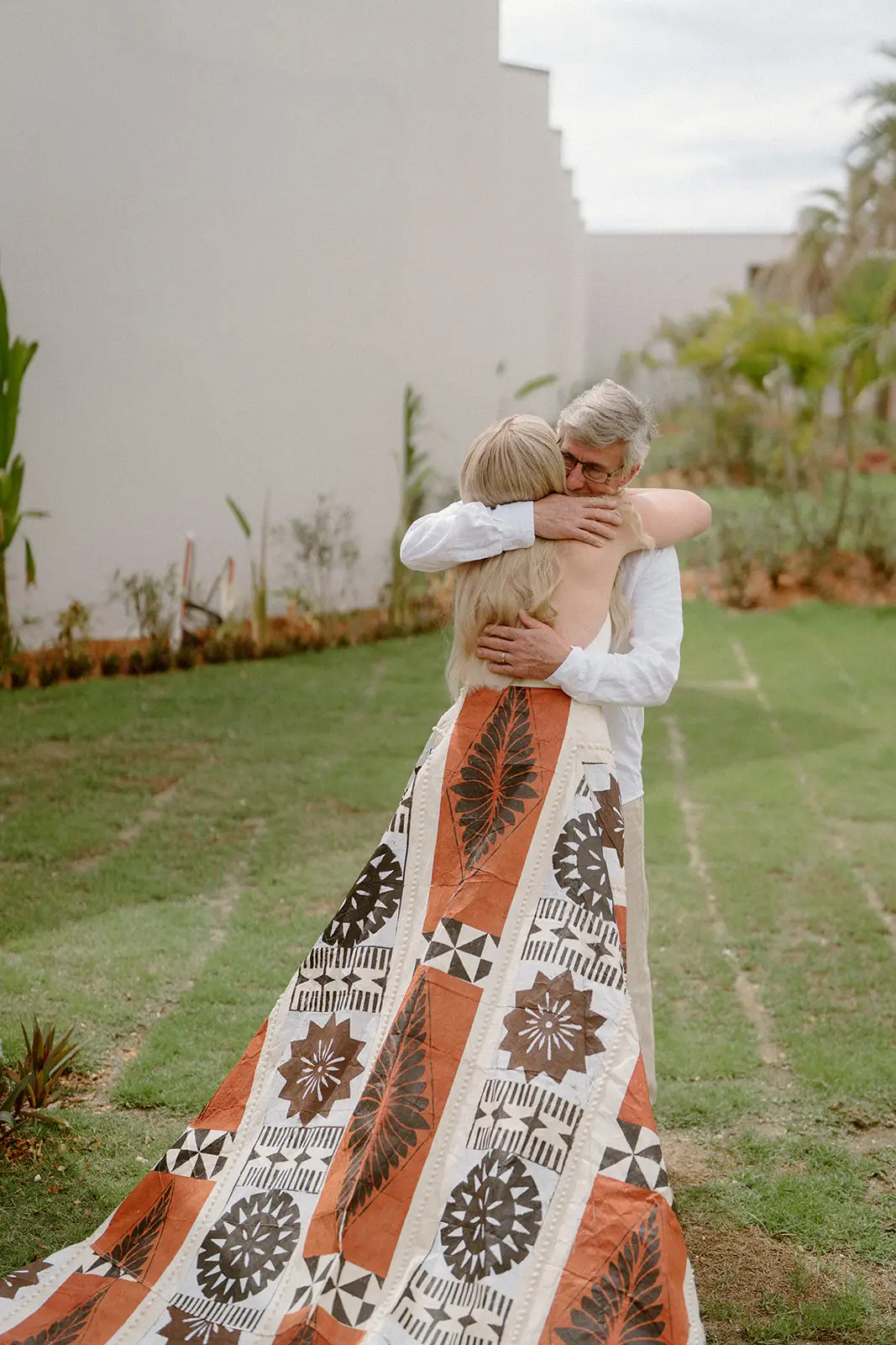 Brittany in a printed robe before changing into her dress, Nadi Bay