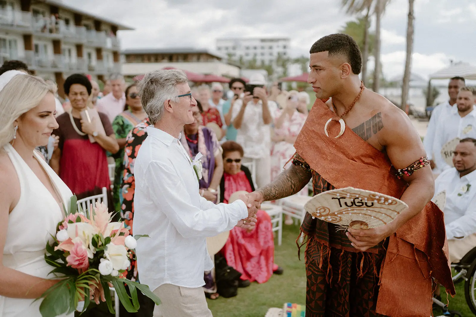 Brittany is welcomed at the front of the aisle by Viliame, Nadi Bay