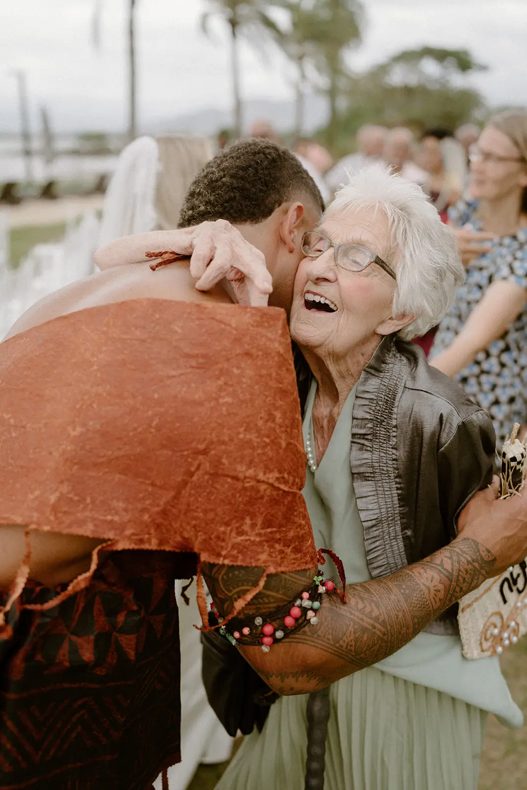 Viliame embracing a guest after the ceremony, Nadi Bay