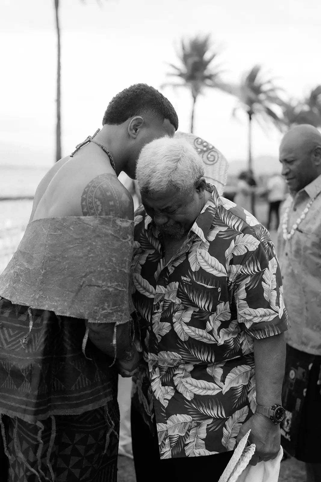 An emotional embrace after the ceremony, Nadi Bay