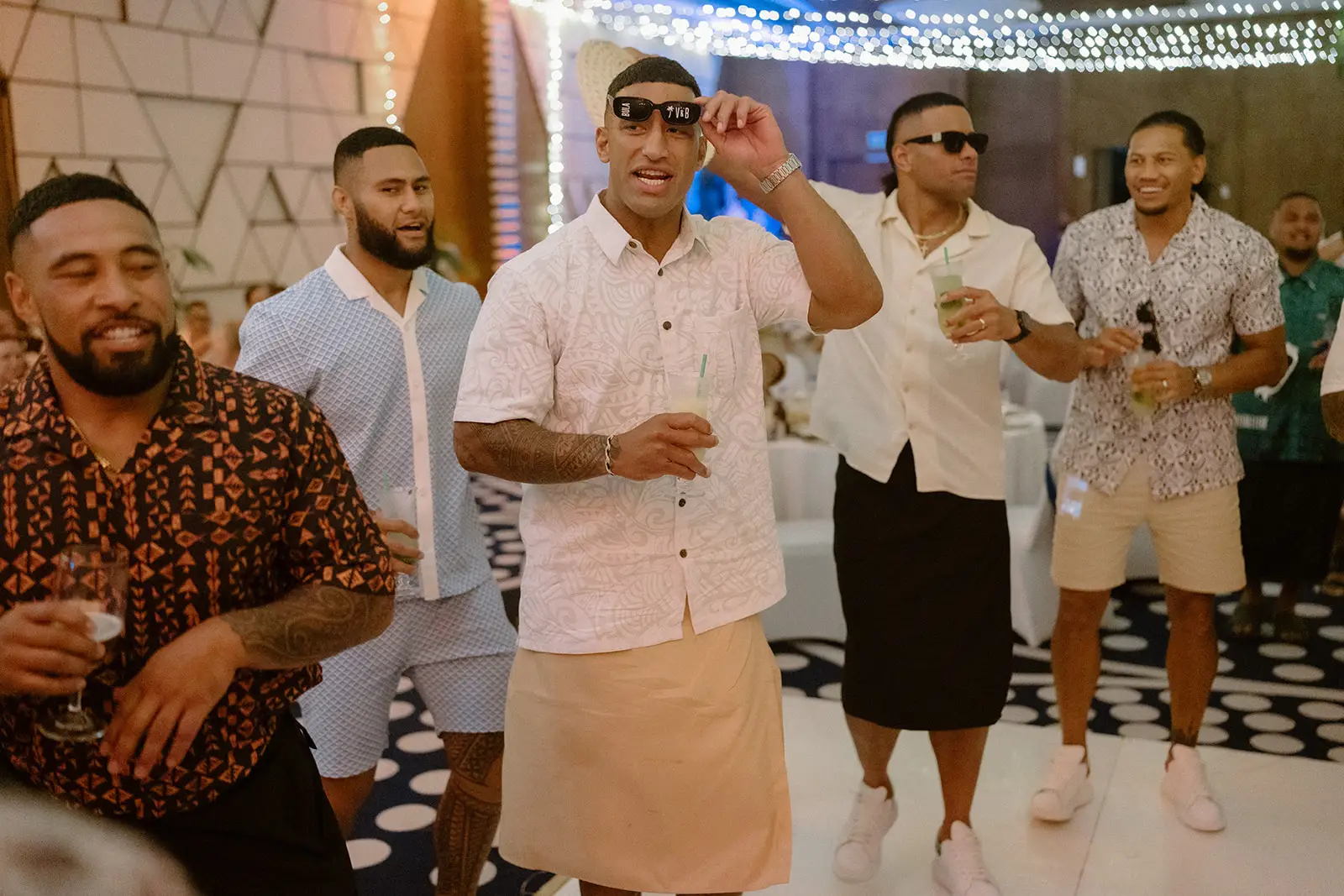 Groomsmen dancing at the reception, Nadi Bay