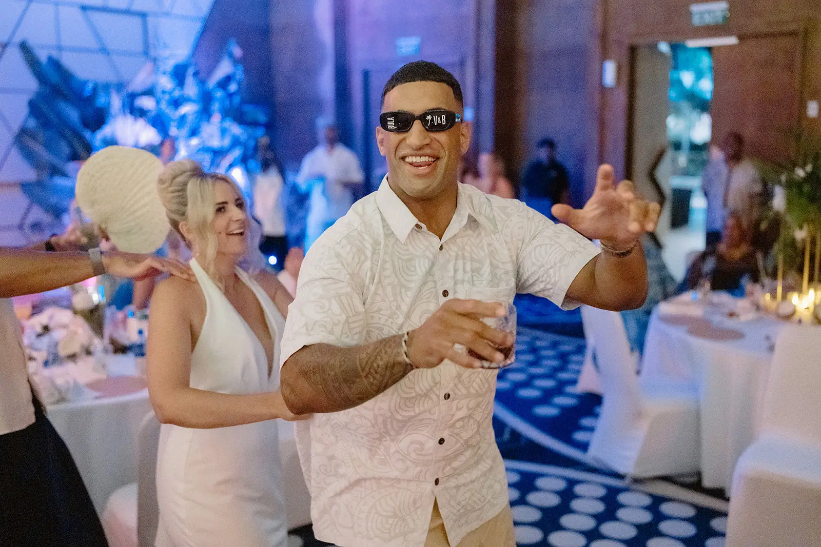 A guest dancing with Brittany at the reception, Nadi Bay