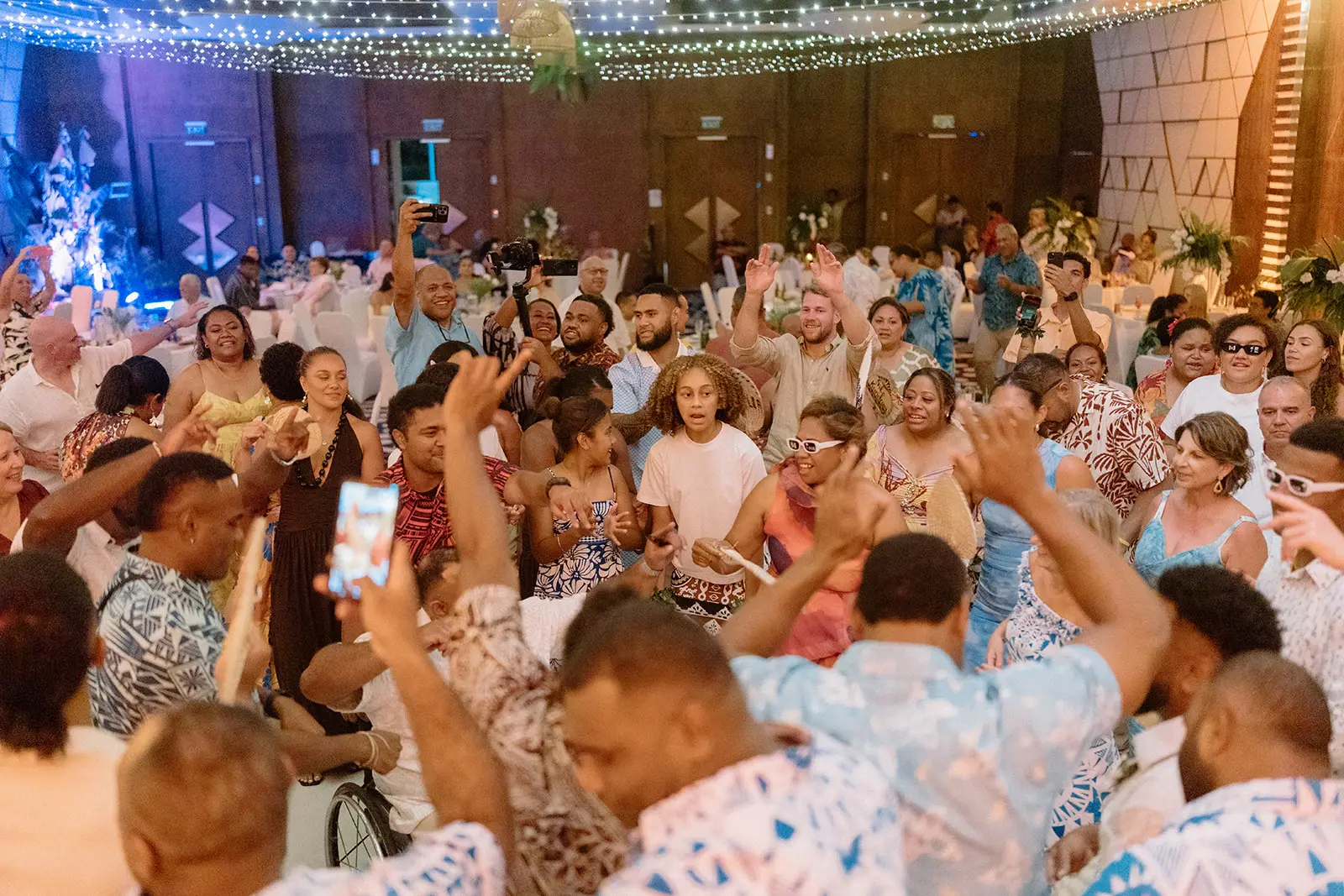 The reception in full swing under fairy lights, Crowne Plaza Nadi Bay