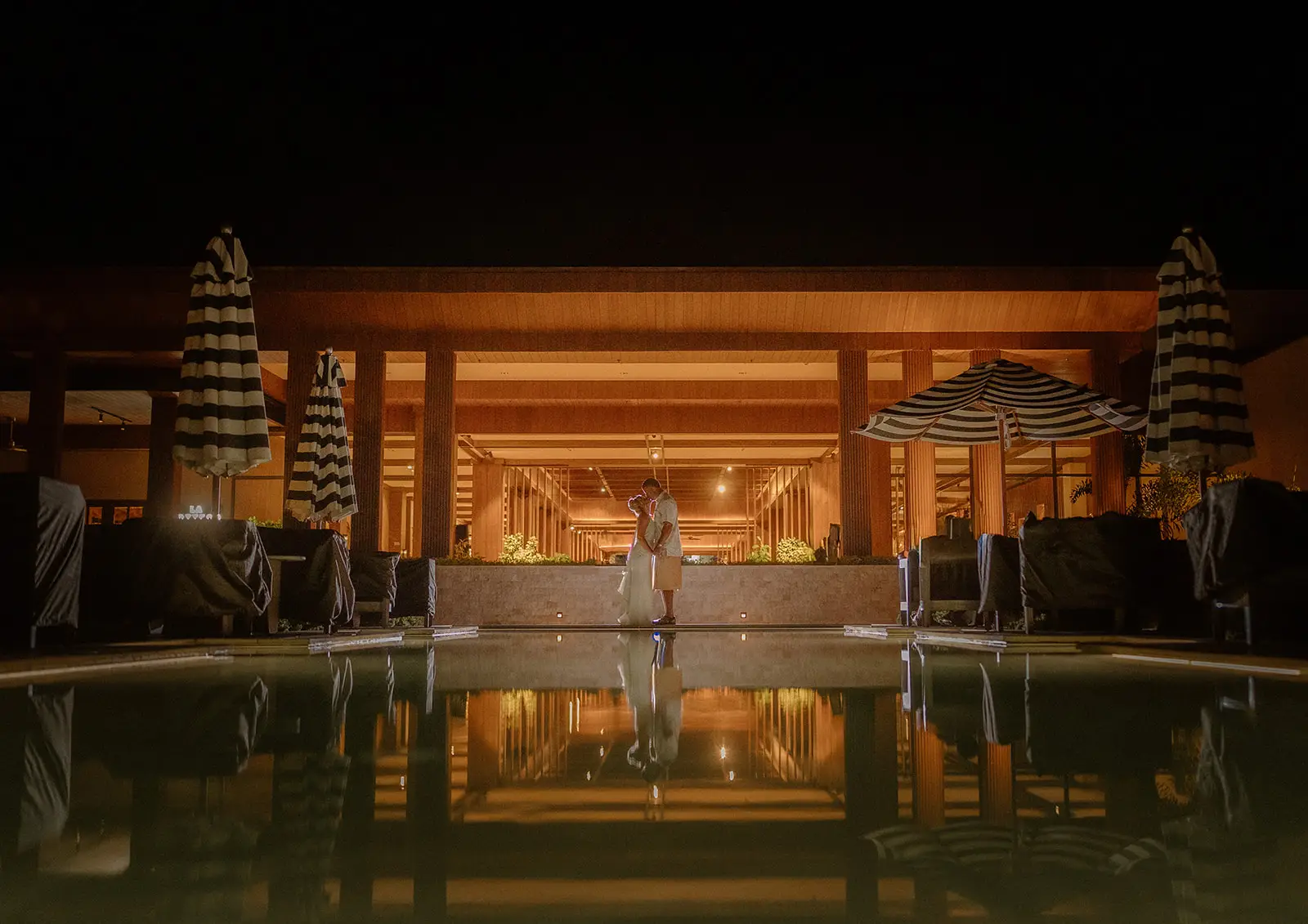 The Crowne Plaza reflected in the pool at night, Nadi Bay, Fiji