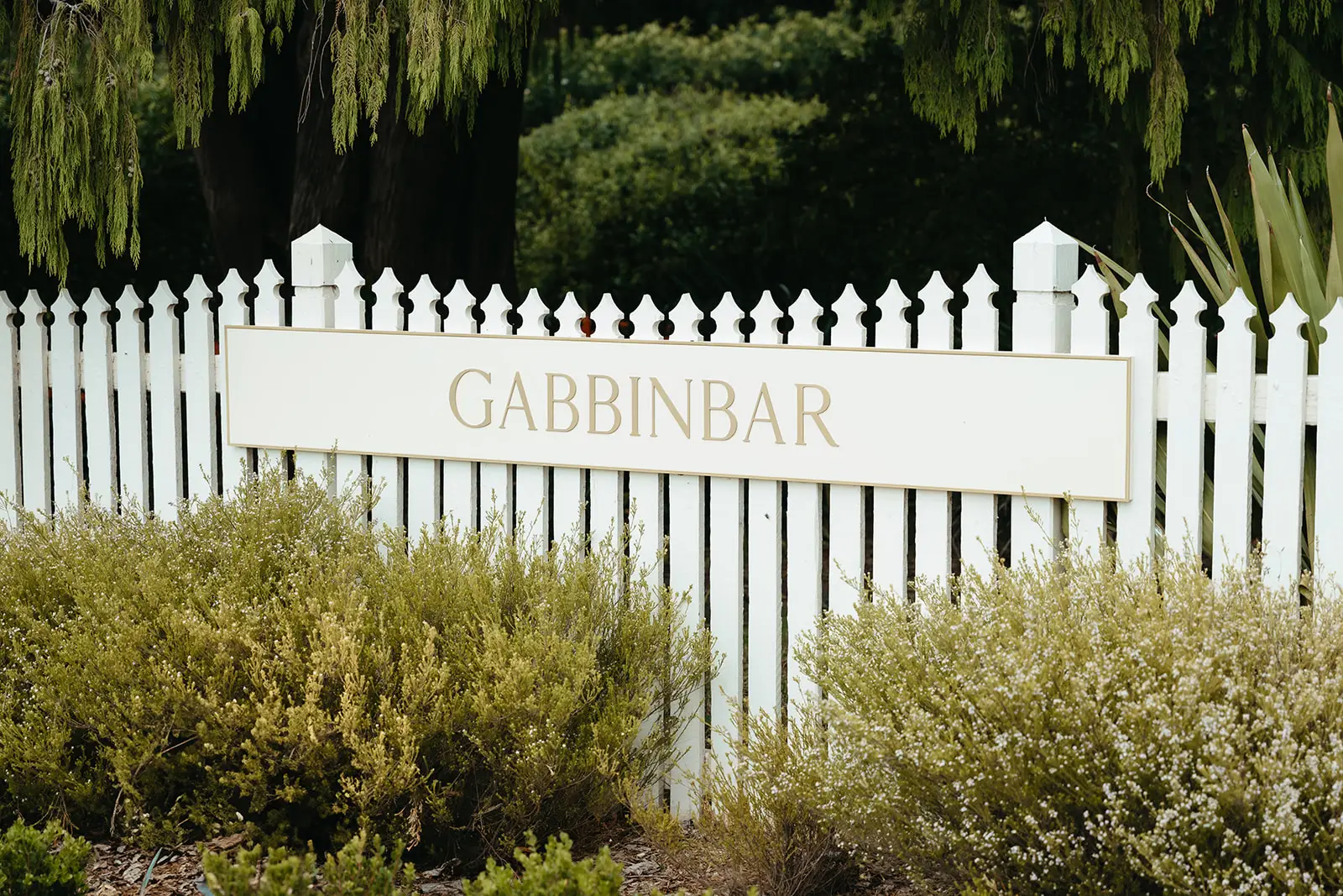 The estate sign on the white picket fence at the entrance, Gabbinbar Homestead