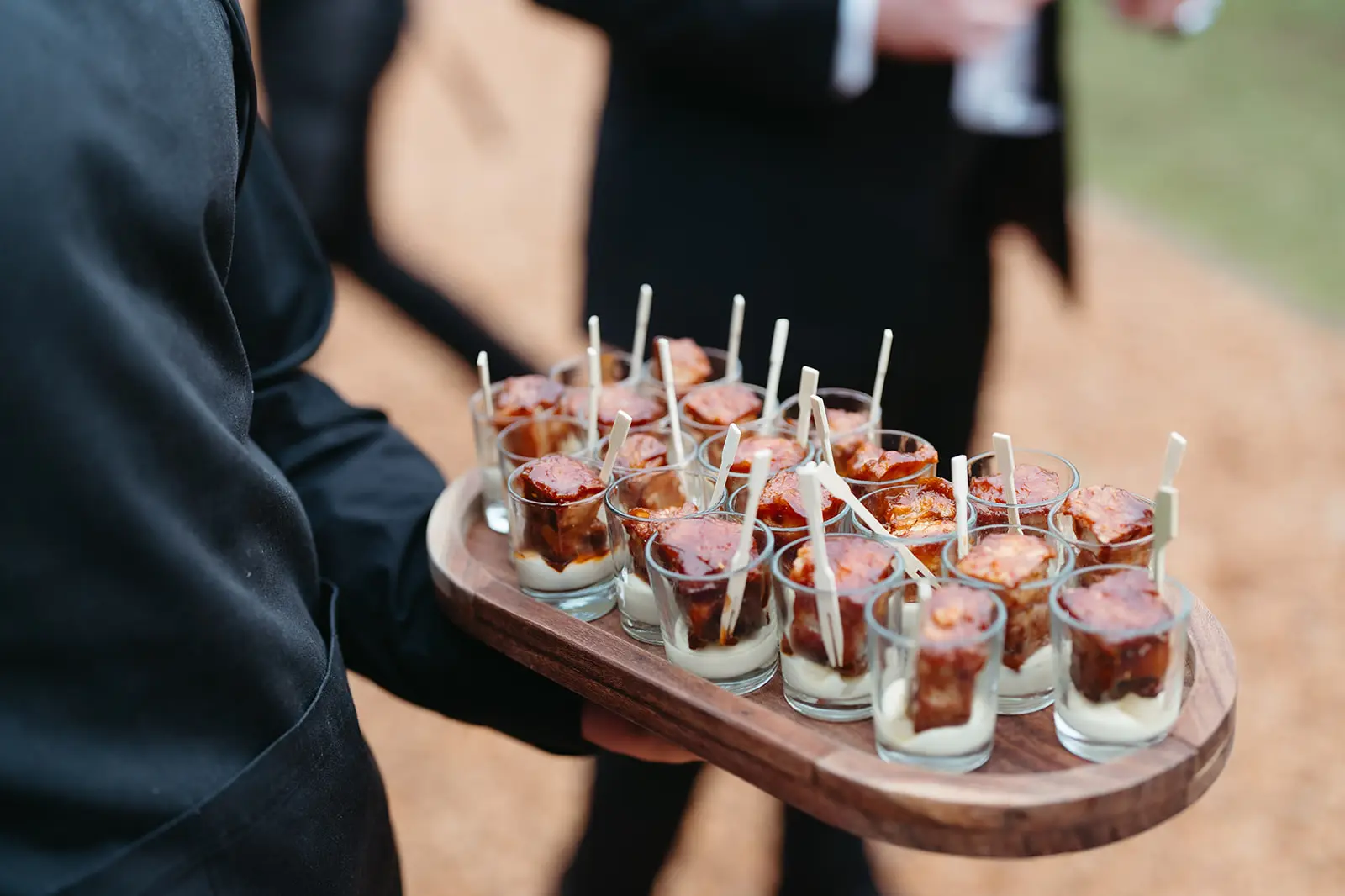 A tray of dessert glasses coming out to the lawn, Gabbinbar Homestead