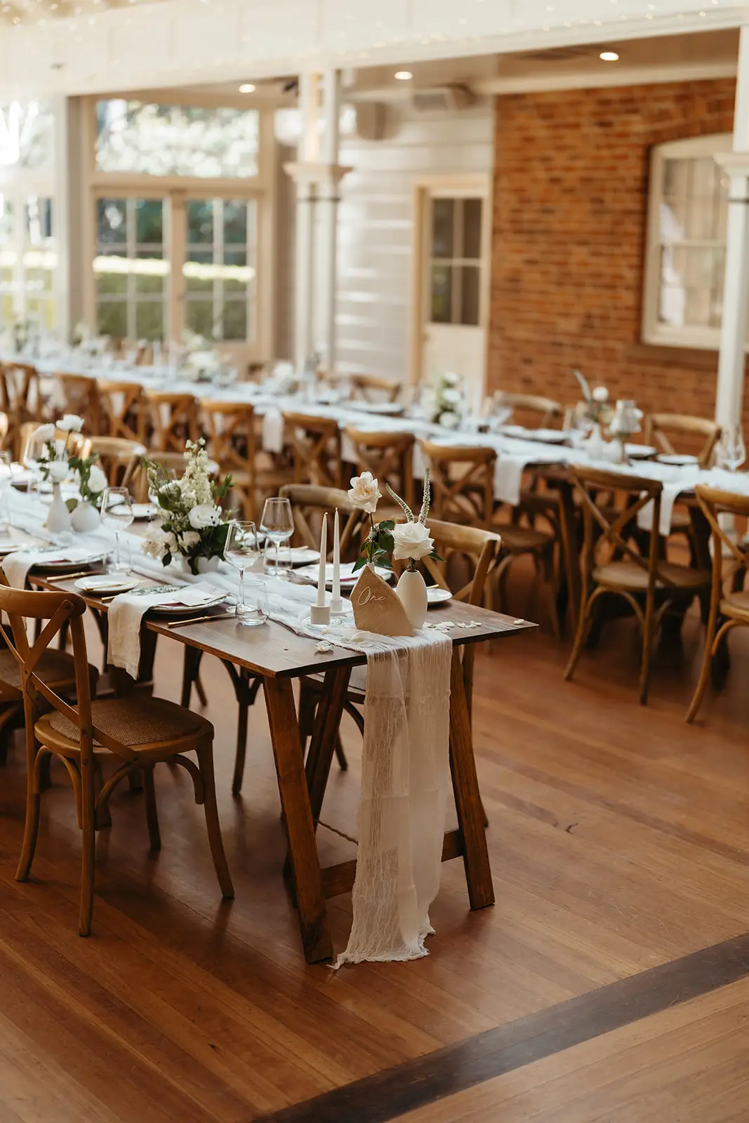 Long tables set in the brick-walled room off the verandah, Gabbinbar Homestead