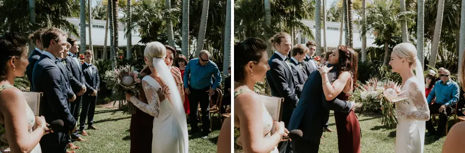 Jessica walking down the aisle and guests turning to watch, Goremans Road